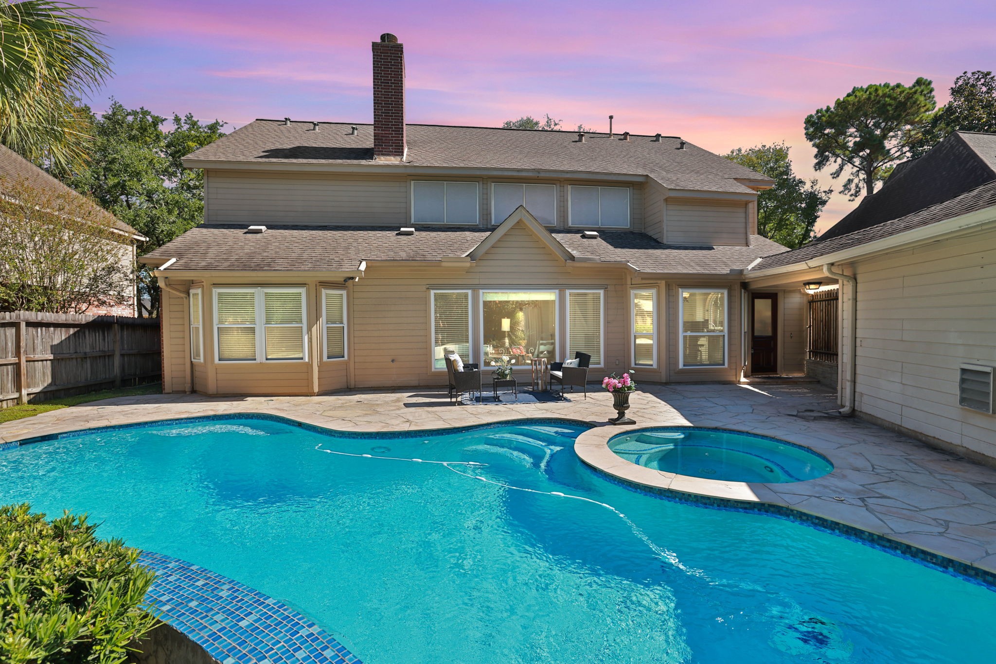 Beautiful remodeled pool with spa and waterfall in this 5 bedroom home.