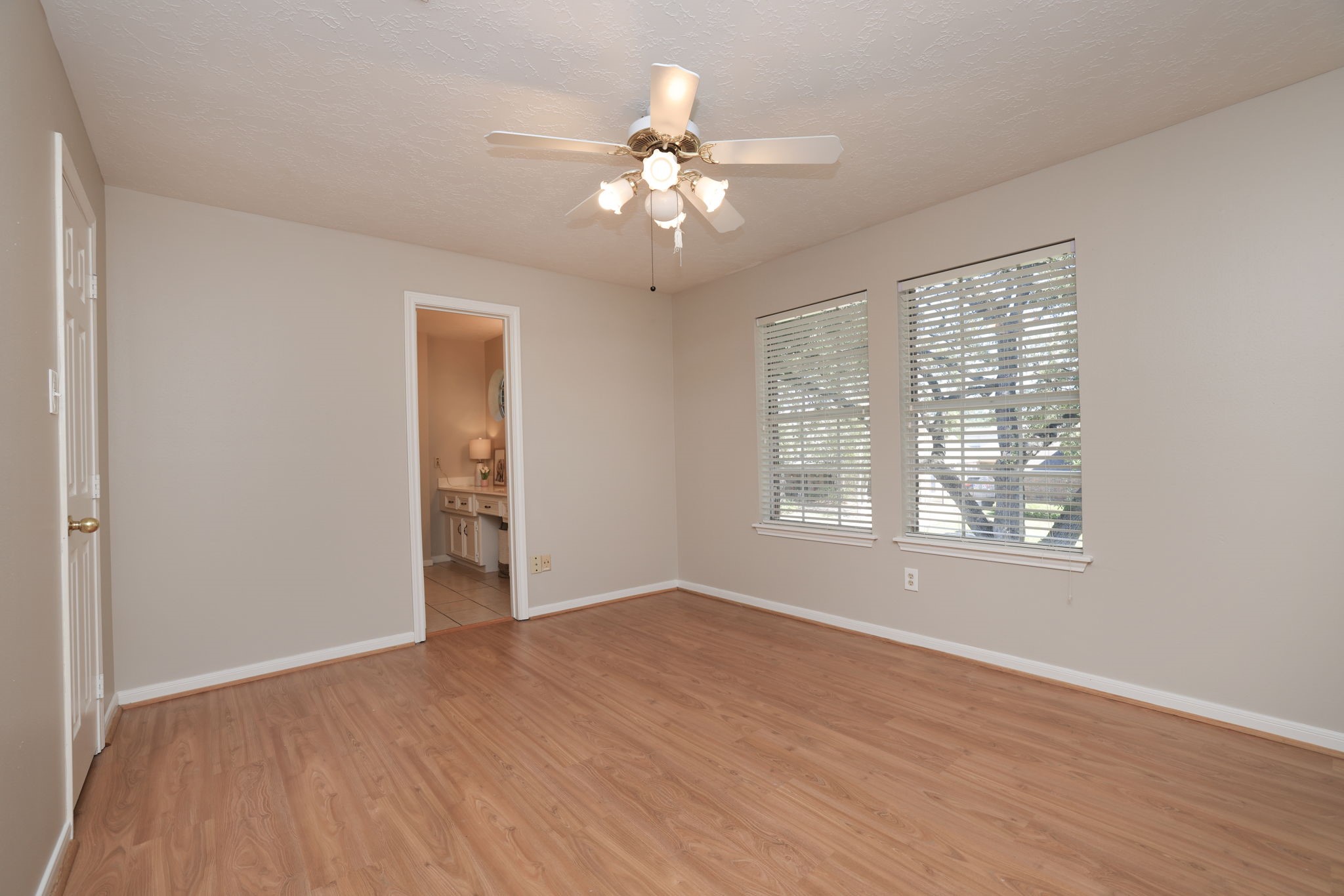 Third upstairs bedroom with views of the backyard and convenient access to the full hall bath.