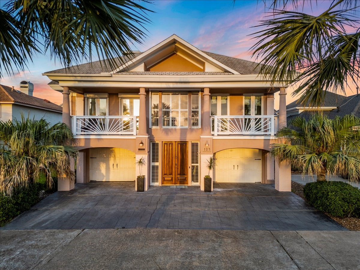 SITUATED IN MARINER'S COVE ON A QUIET CANAL WITH DIRECT ACCESS TO GALVESTON BAY, 123 PORT STREET WAS CUSTOM BUILT WITH BEAUTIFUL TOUCHES THROUGHOUT.  THE PROPERTY ALSO ADJOINS AN EASEMENT WHICH PROVIDES MORE PRIVACY THAN OTHER PROPERTIES IN THE COMMUNITY.