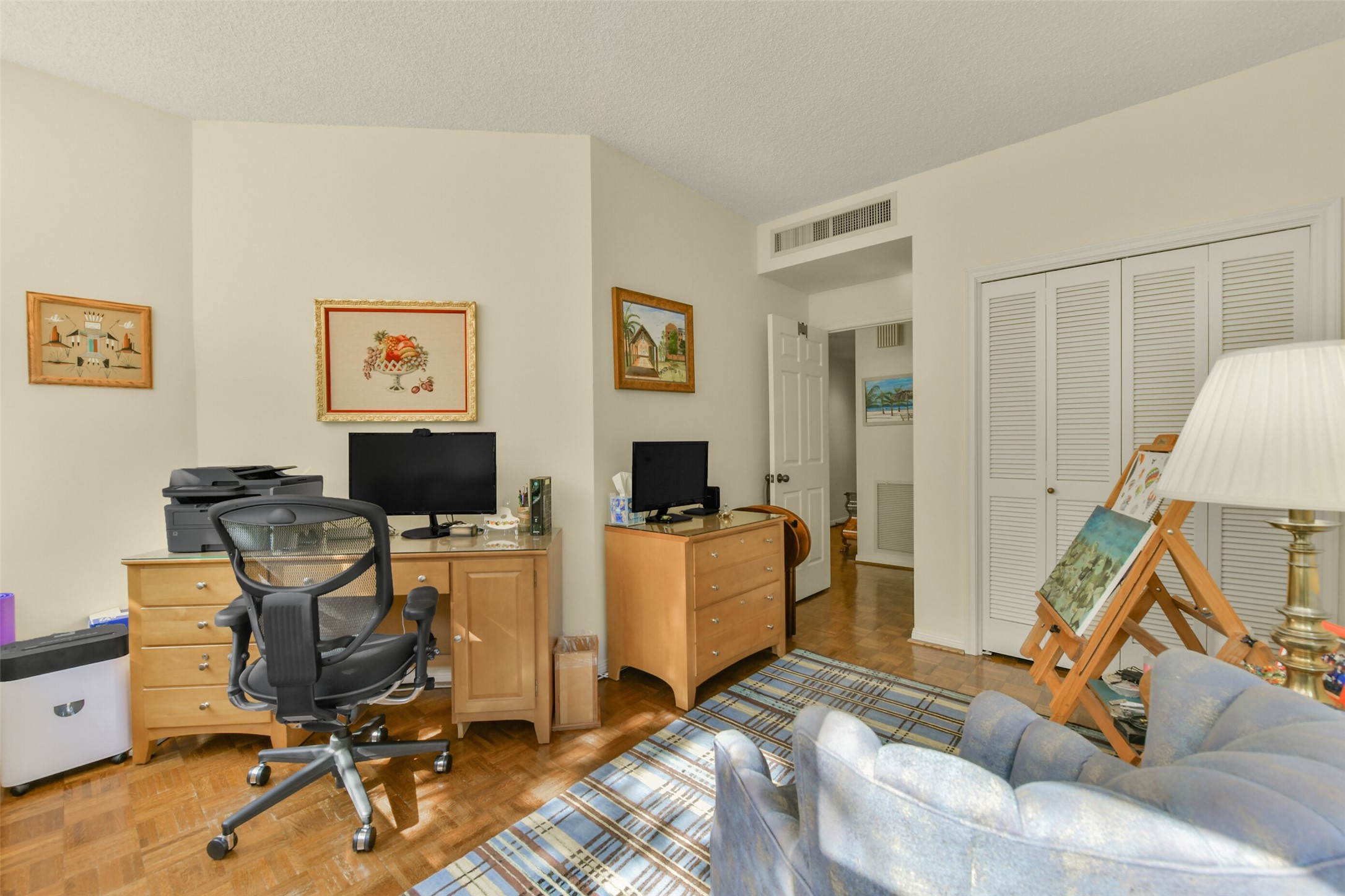 The secondary bedroom is directly across from the guest bathroom.
