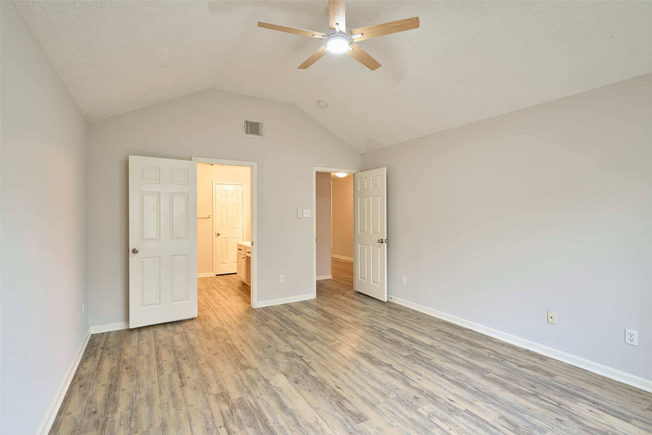 Primary bedroom has high ceiling and plenty of room for your king size bed! Primary bedroom has high ceiling and plenty of room for your king size bed!