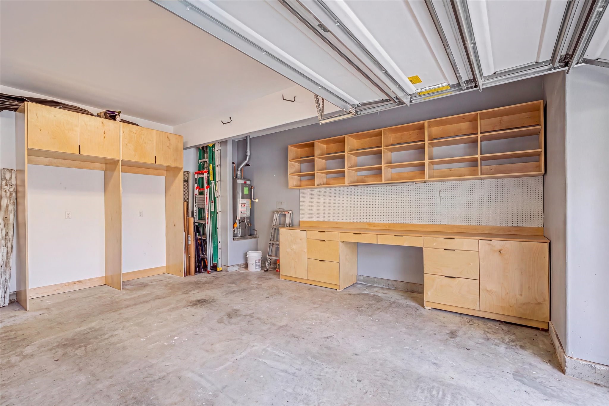 Custom working space in garage with storage