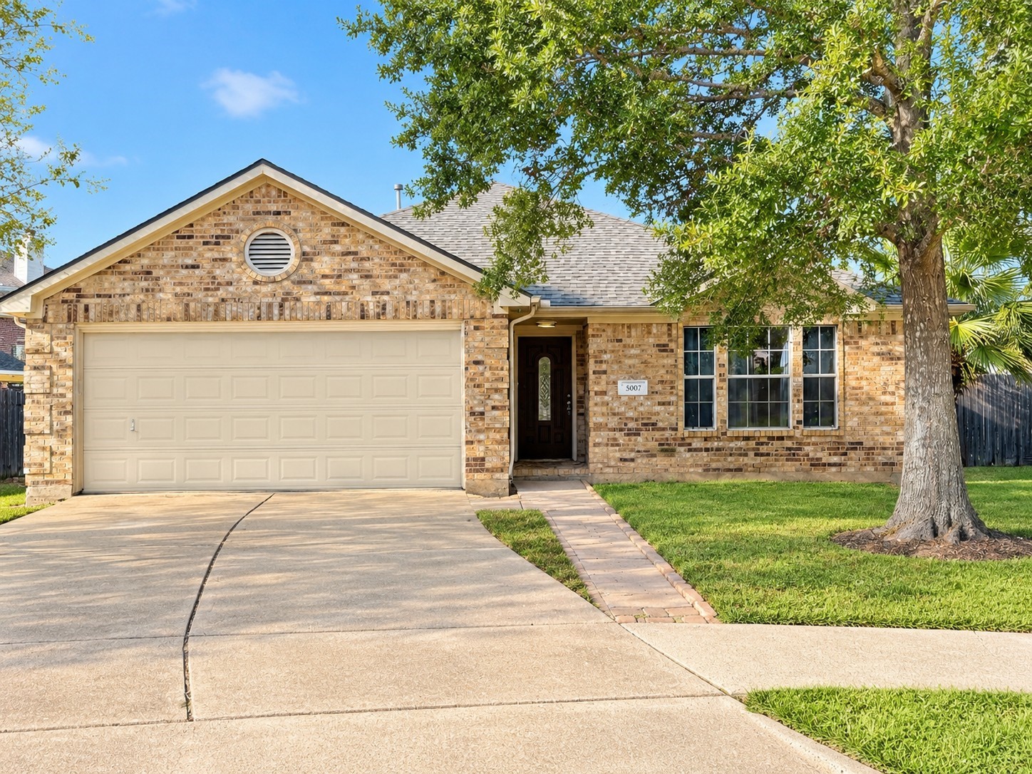 Located in the cul-de-sac. All pictures are actual, however grass, driveway/sidewalk coloring and interior wall coloring are AI enhanced. Interior and garage door still needs to be painted.