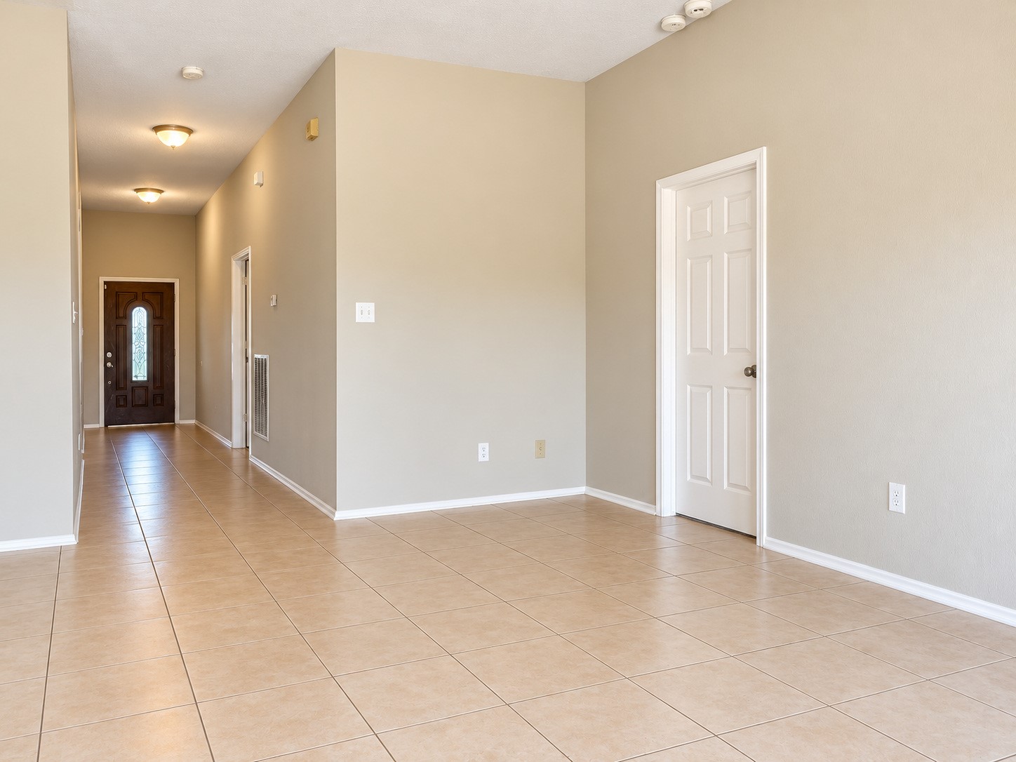 Looking back from family room with entry to primary on the right. Looking back from family room with entry to primary on the right.