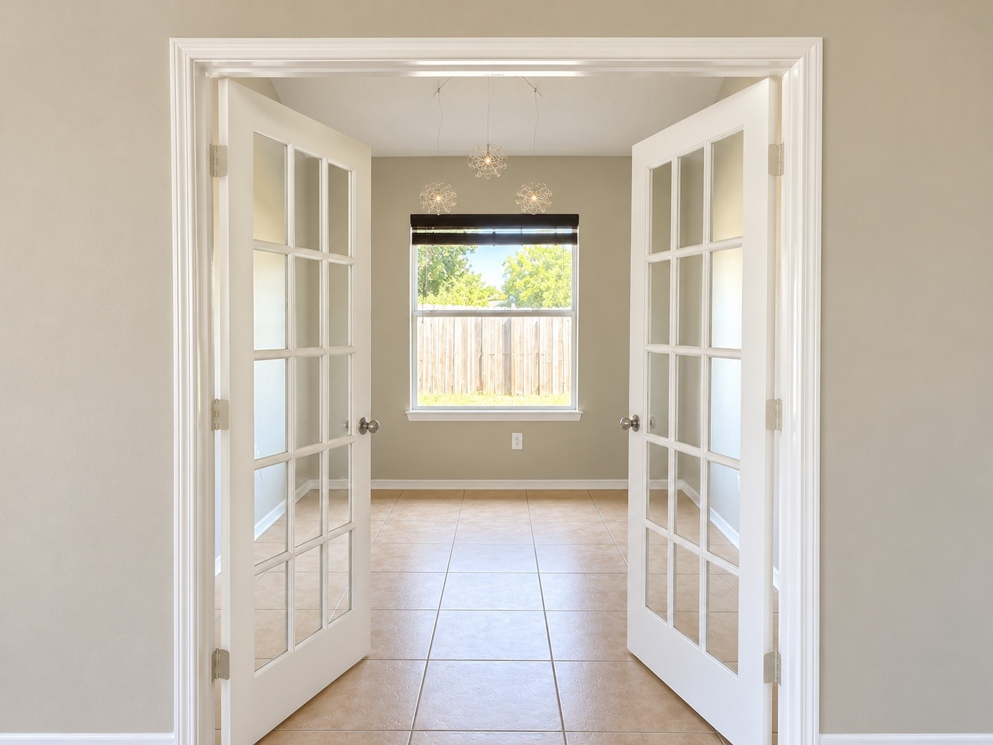 Office has beautiful French doors looks out into the backyard. Office has beautiful French doors looks out into the backyard.