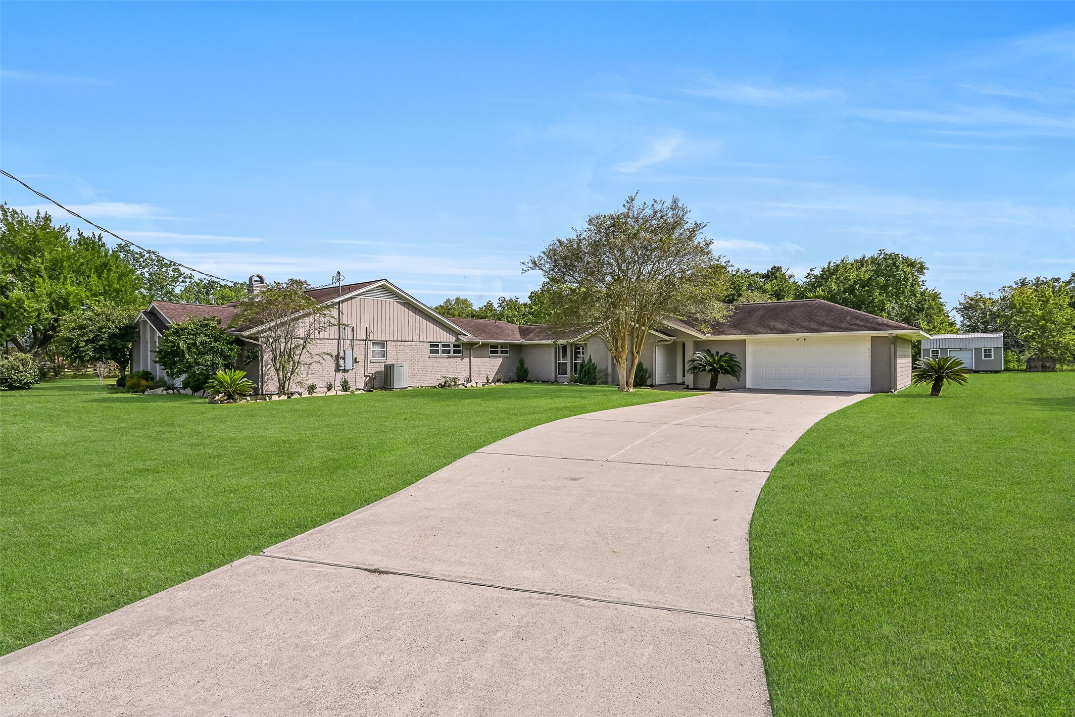 Driveway - Second Residence:
A separate driveway extends from Chester Drive to the 2-car attached garage that services this 2-bedroom, 2-bathroom single story home.