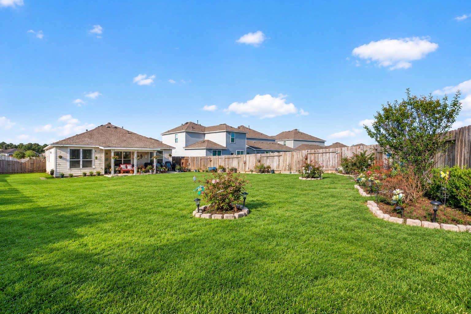 Look at the size of this yard!  Big enough to run, play baseball, or football !
