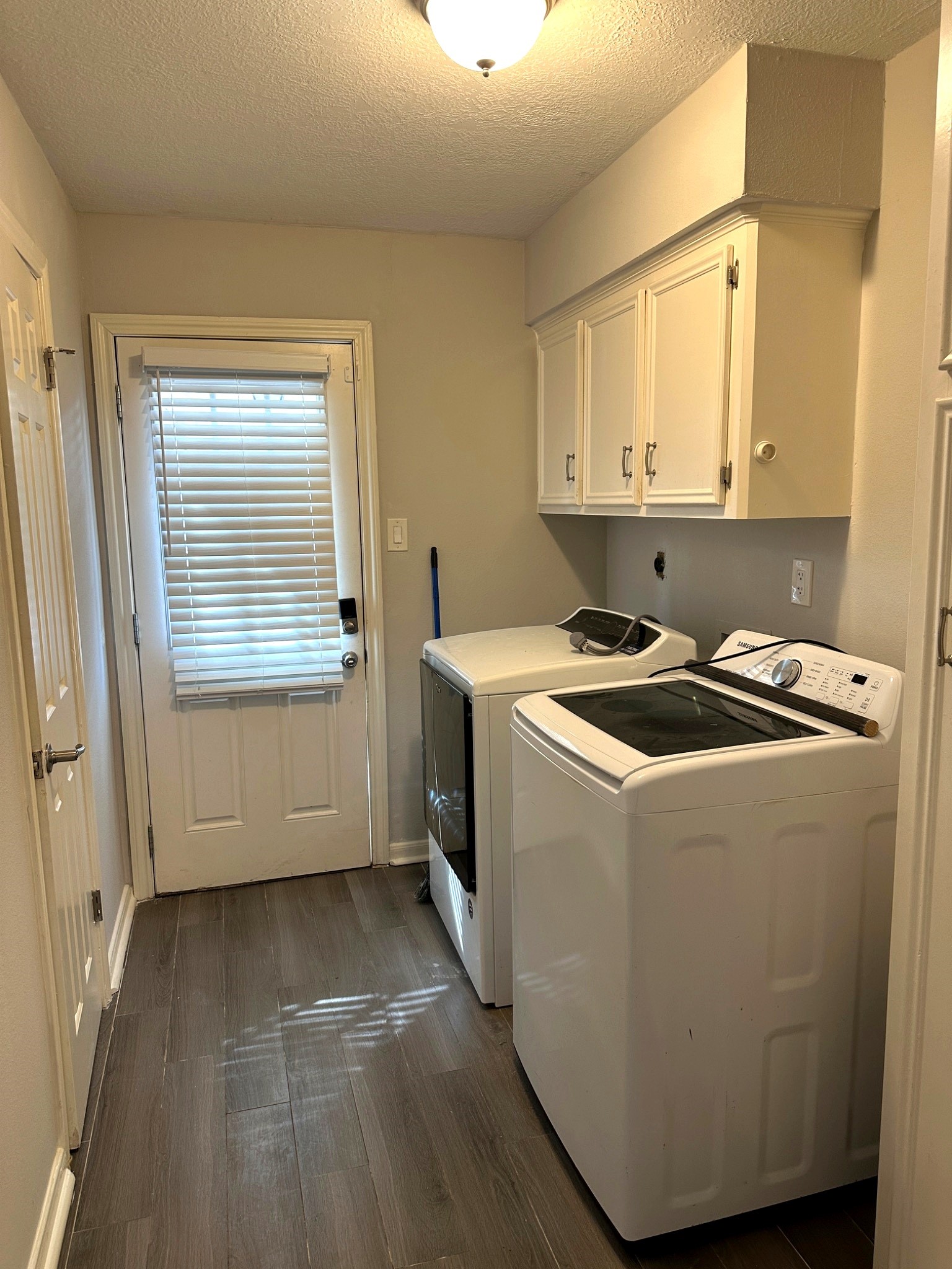 Laundry located off Kitchen
