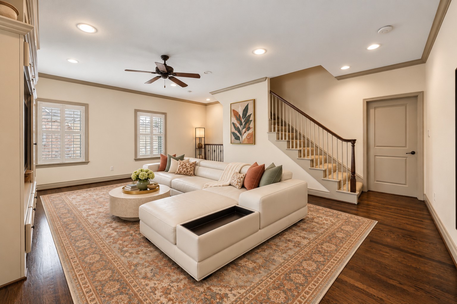 Beautiful view showcasing thoughtful layout of 2nd floor game room, conveniently positioned near primary suite & two secondary bedrooms. Spacious utility room is located  just off game room, along with the primary & 2 guest beds. Wonderful additional living space offering both comfort & functionality! Virtually staged.