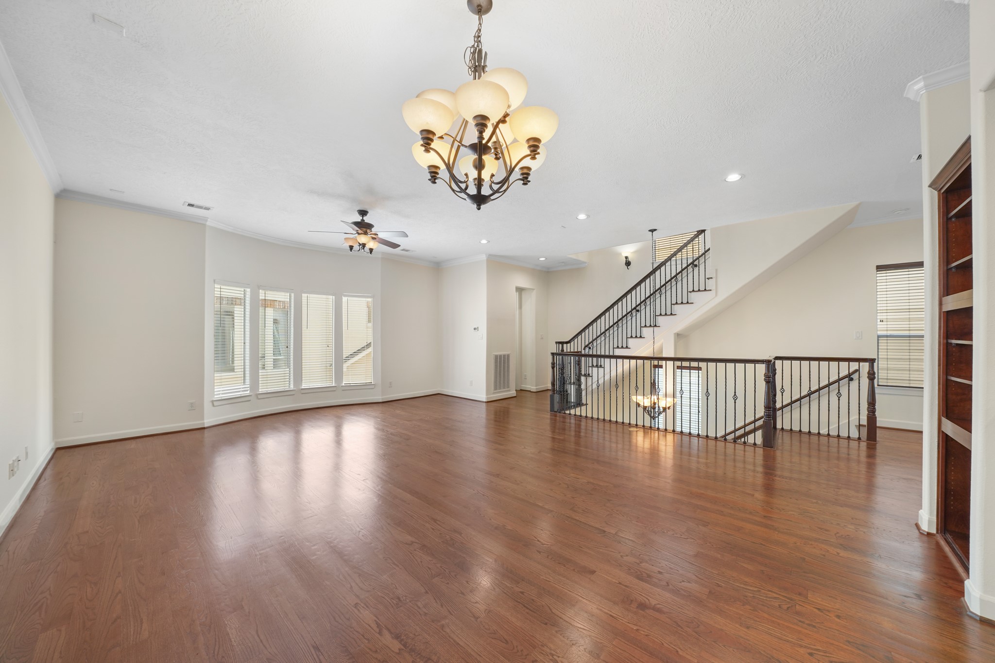 This angle showcases how spacious this area really is! Plenty of natural light will come through the large windows throughout the day.