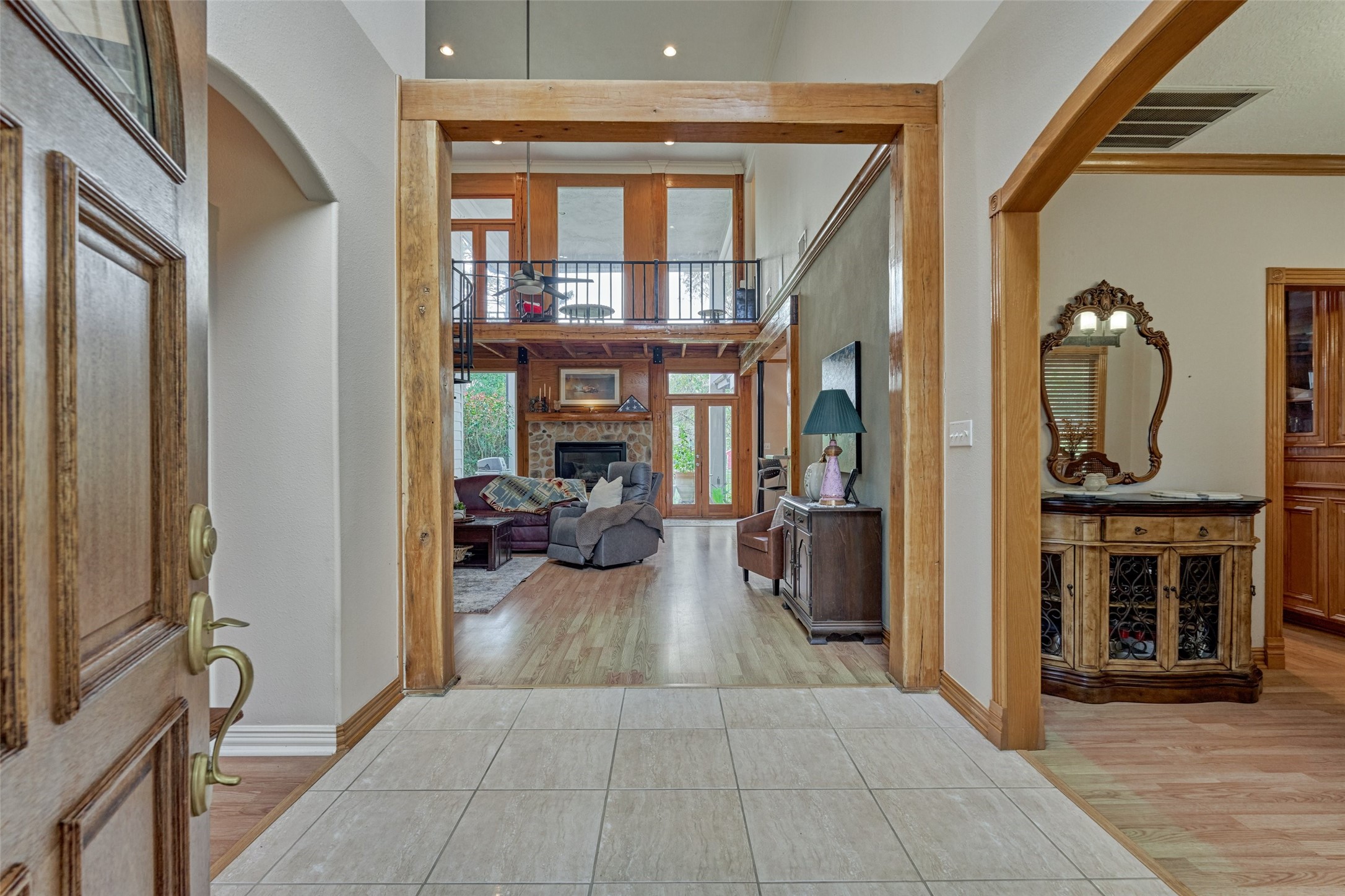 View entering the home. Secondary bedrooms to the left hallway, dining/kitchen/breakfast to your right, Living Room straight ahead. Owners suite is separate from other bedrooms off of living room.