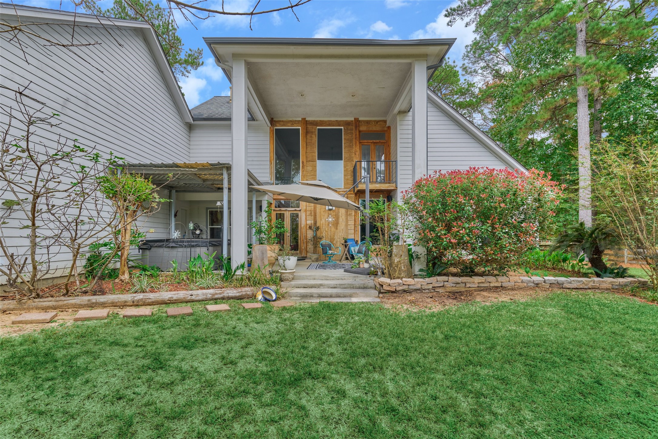 Back view of home with patio