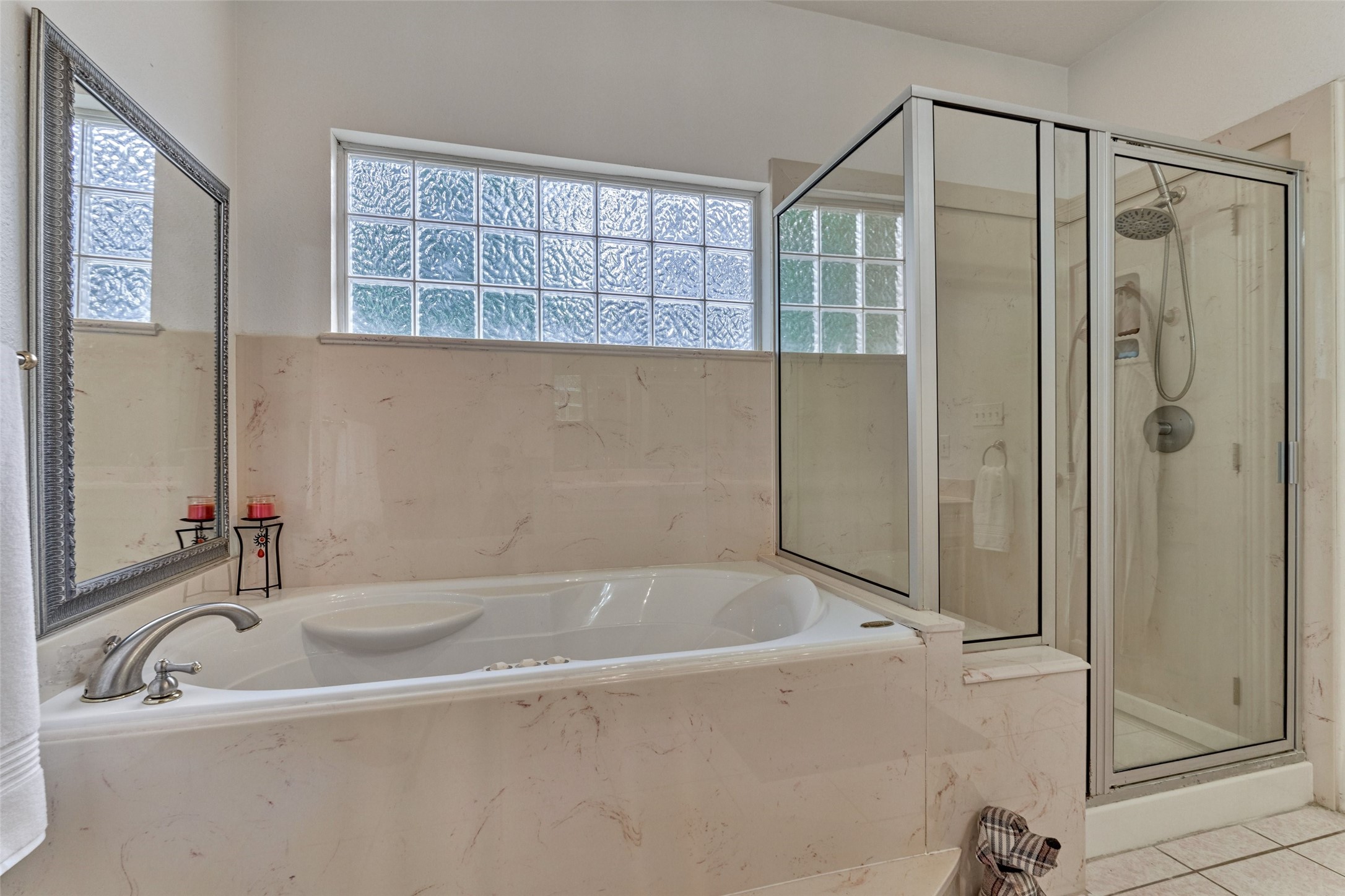 Owners Suite jacuzzi tub and separate shower