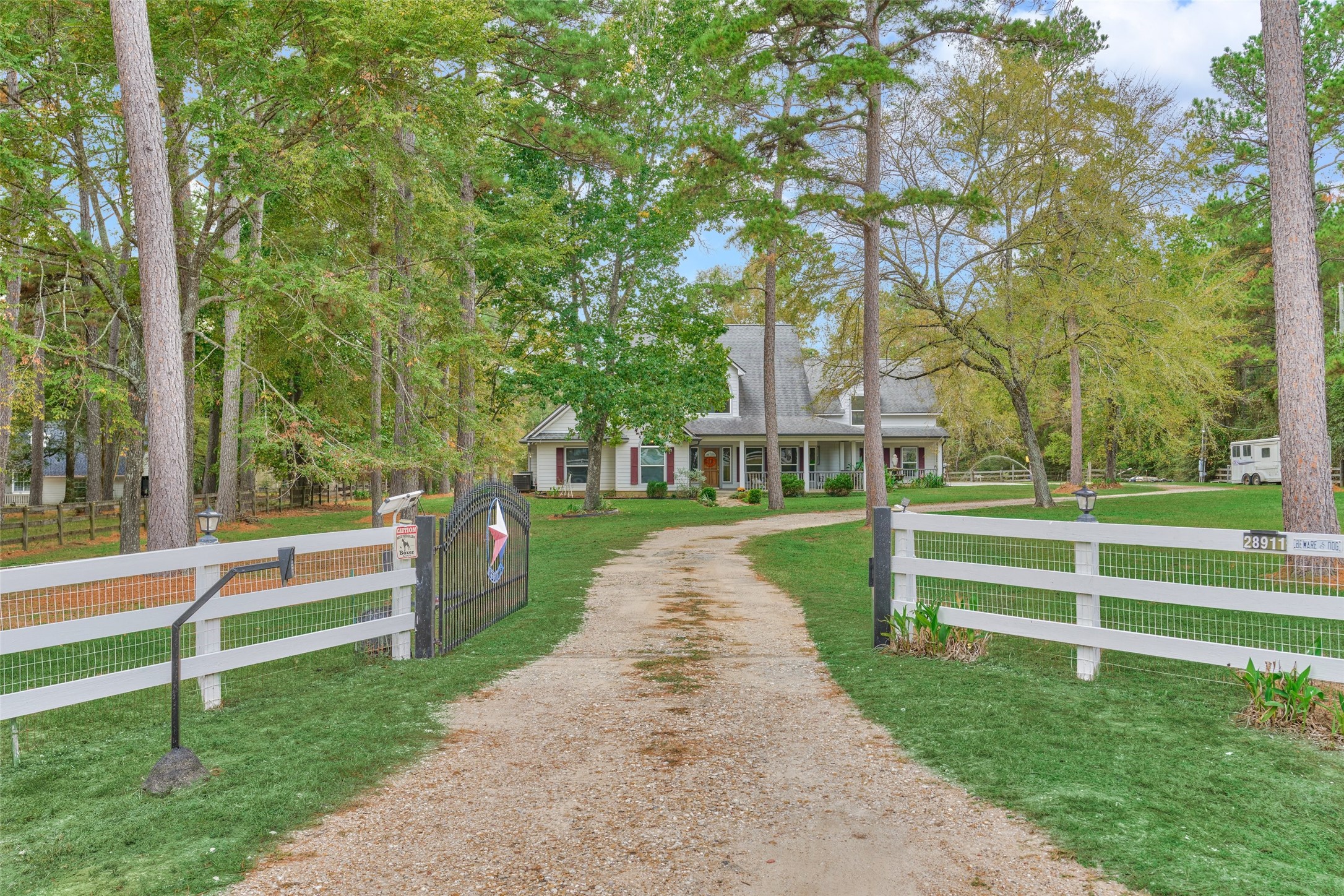 Welcome home to this charming gated country retreat on three acres in Indigo Lake Estates of Magnolia. Welcome home to this charming gated country retreat on three acres in Indigo Lake Estates of Magnolia.