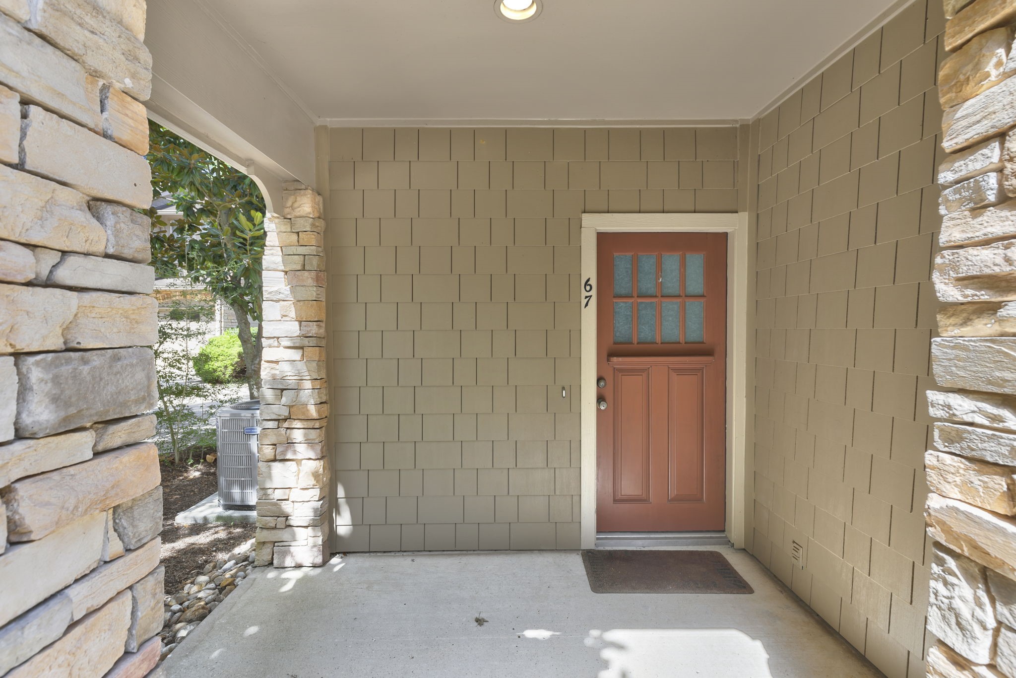 Spacious and charming covered entry to welcome you home.