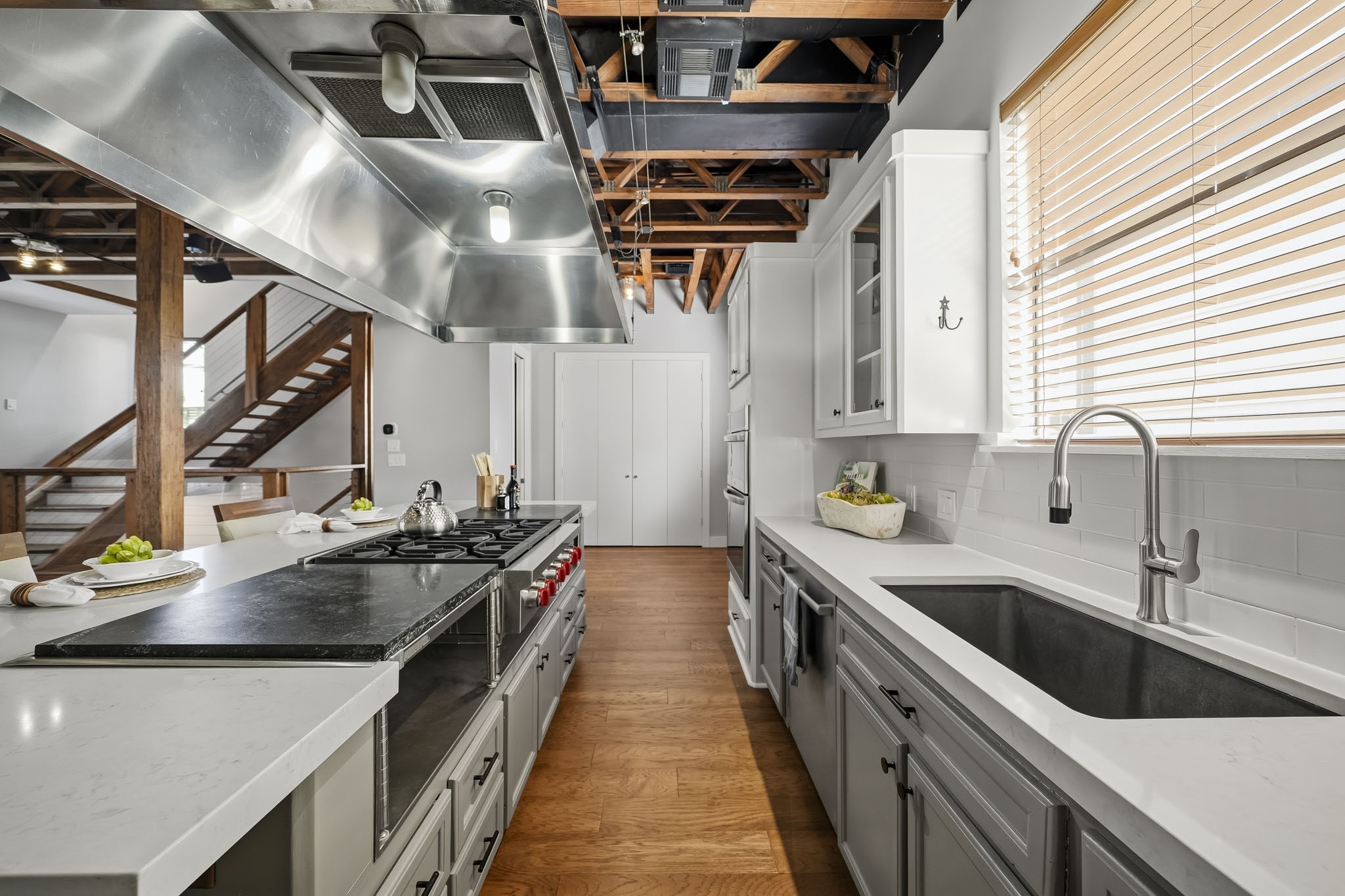 A culinary enthusiasts dream, this beautifully appointed kitchen offers an abundance of countertop space for meal preparation, serving, and entertaining, blending exceptional functionality with timeless elegance.
