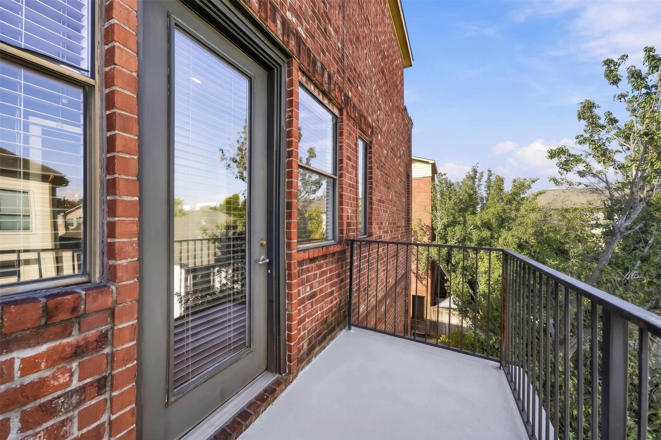 Step onto the private third-floor balcony and take in the surrounding views from an elevated vantage point. A wonderful outdoor escape for enjoying your morning coffee, catching a refreshing breeze, or relaxing beneath the evening sky.