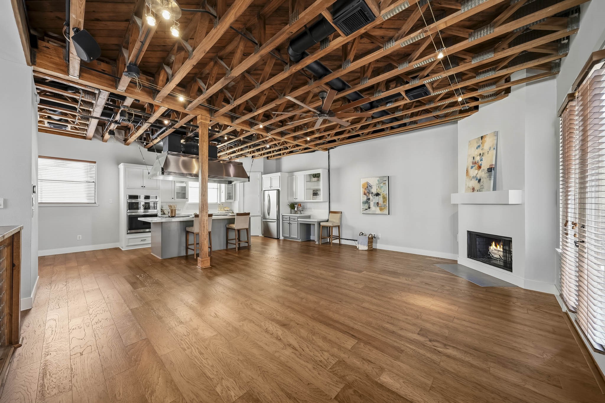 The seamless connection between the family room and kitchen creates an inviting, open-concept setting that brings together sophisticated design and exceptional functionality, ideal for both casual dining and gracious entertaining.