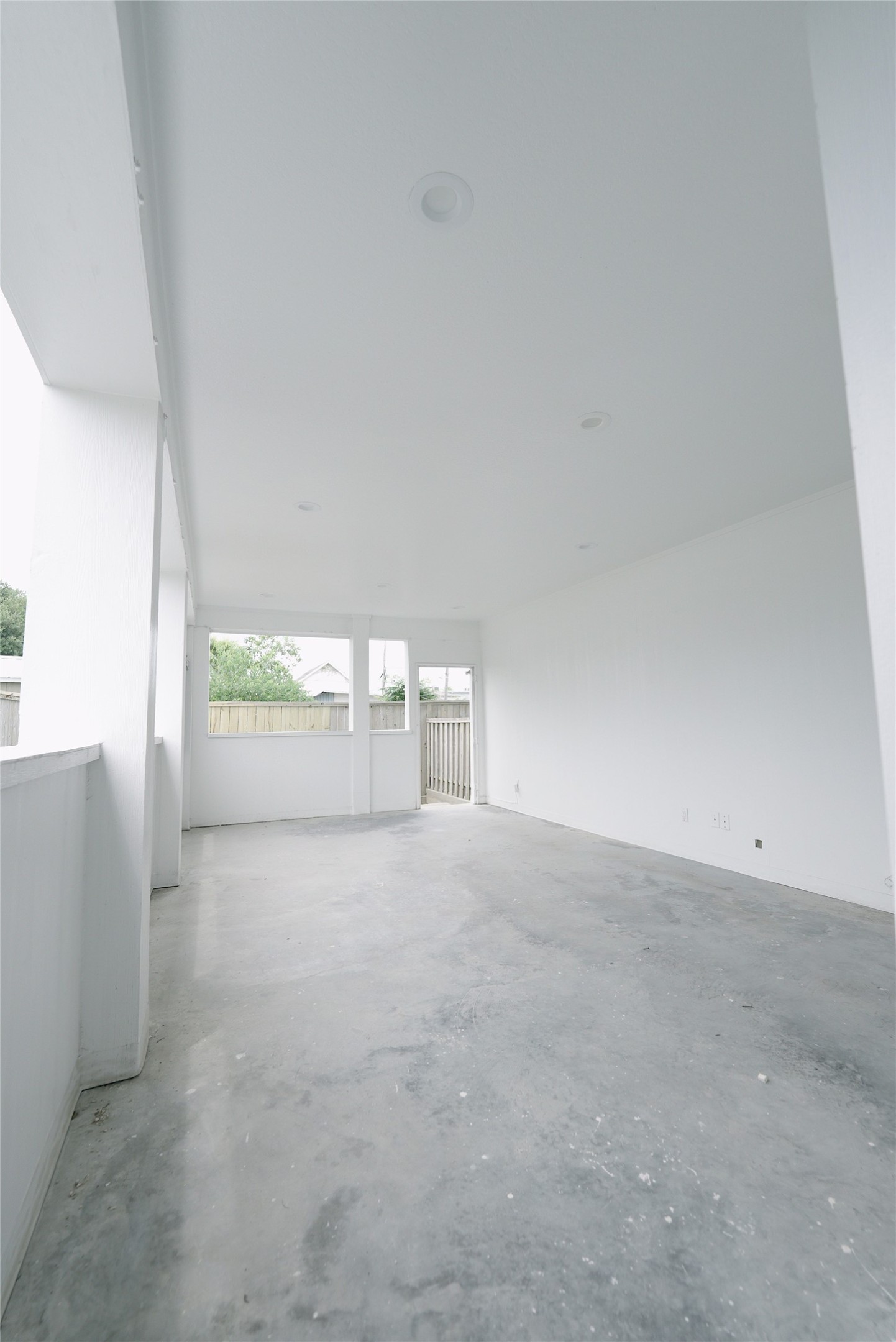 Spacious covered patio perfect for outdoor entertaining and relaxation.
