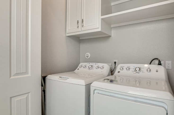 Modern convenience meets comfort with an included washer and dryer at 1013 10th A.