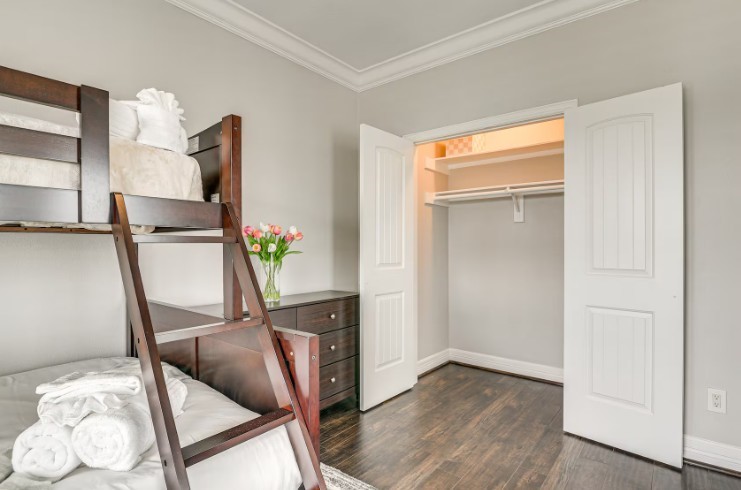 Elegant top-level guest bedroom, fully furnished for comfort and style.