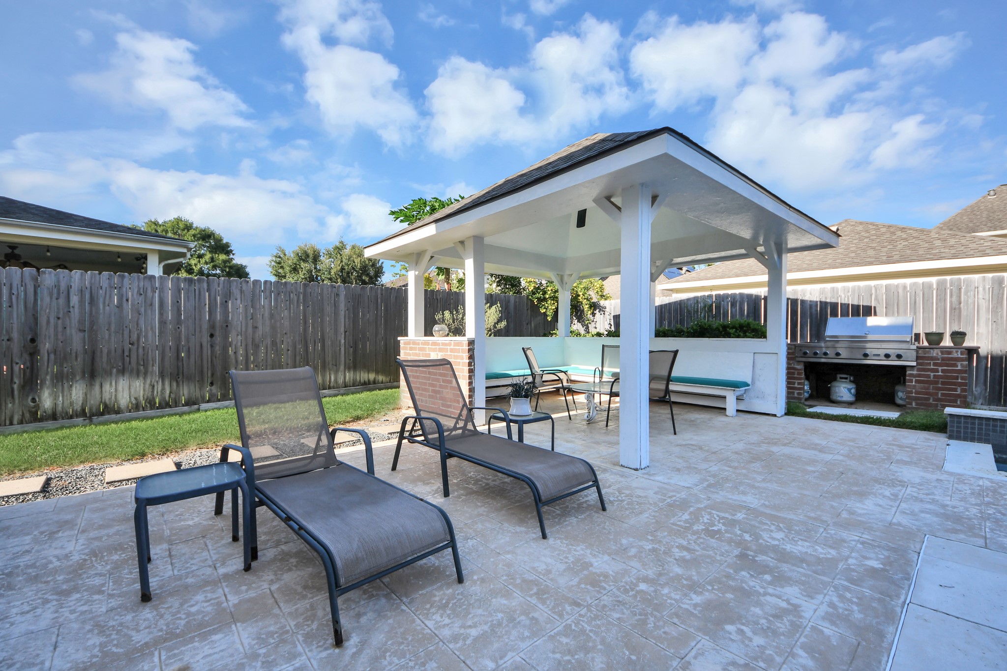 Take in the fresh air with a covered gazebo and outdoor grill, ideal for Texas BBQ's!
