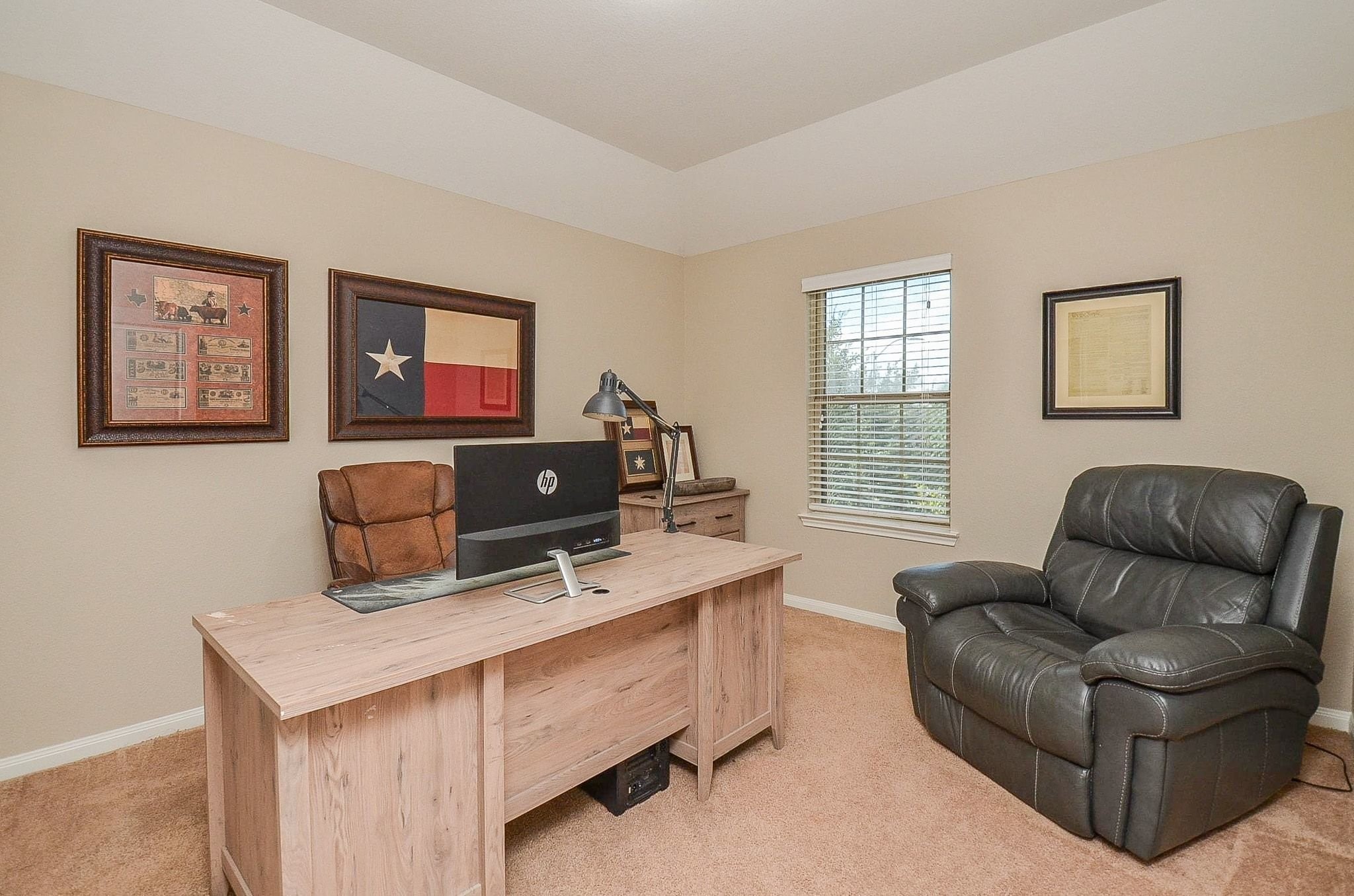 Fourth bedroom upstairs is currently being used as a study and faces the front of the home.
