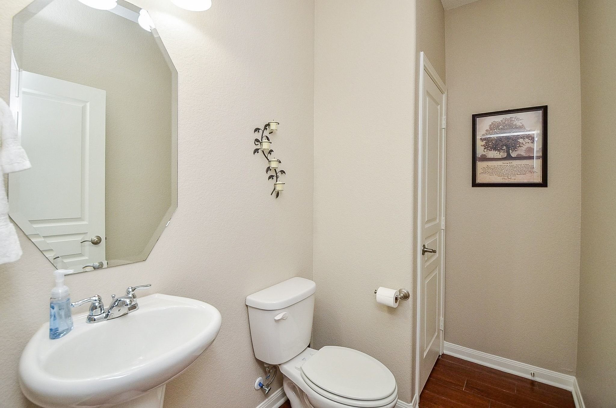 Half bath downstairs that could easily be converted into a full bath  to create a second primary bedroom downstairs.