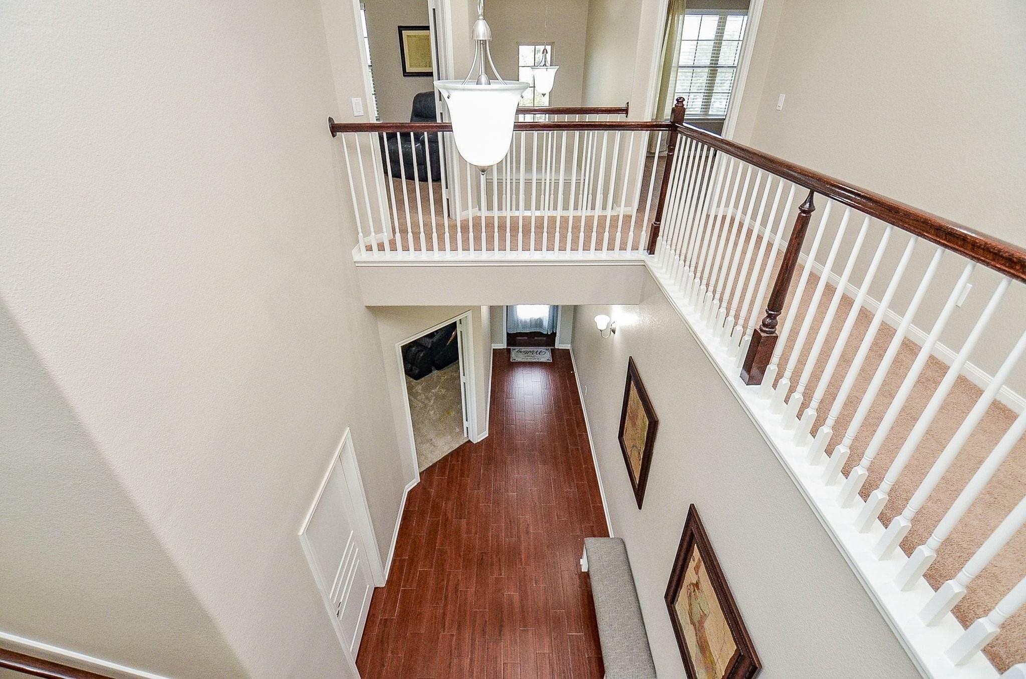 View of the entryway from the upstairs balcony.