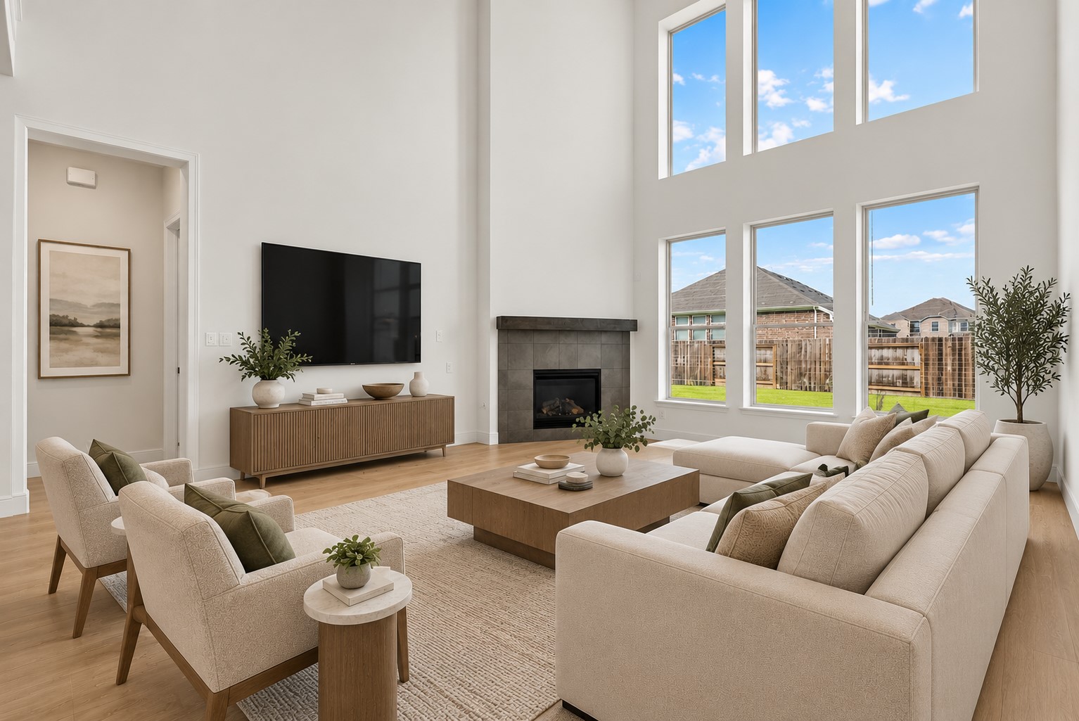 Soaring ceilings and Family Room with an abundance of natural light.
