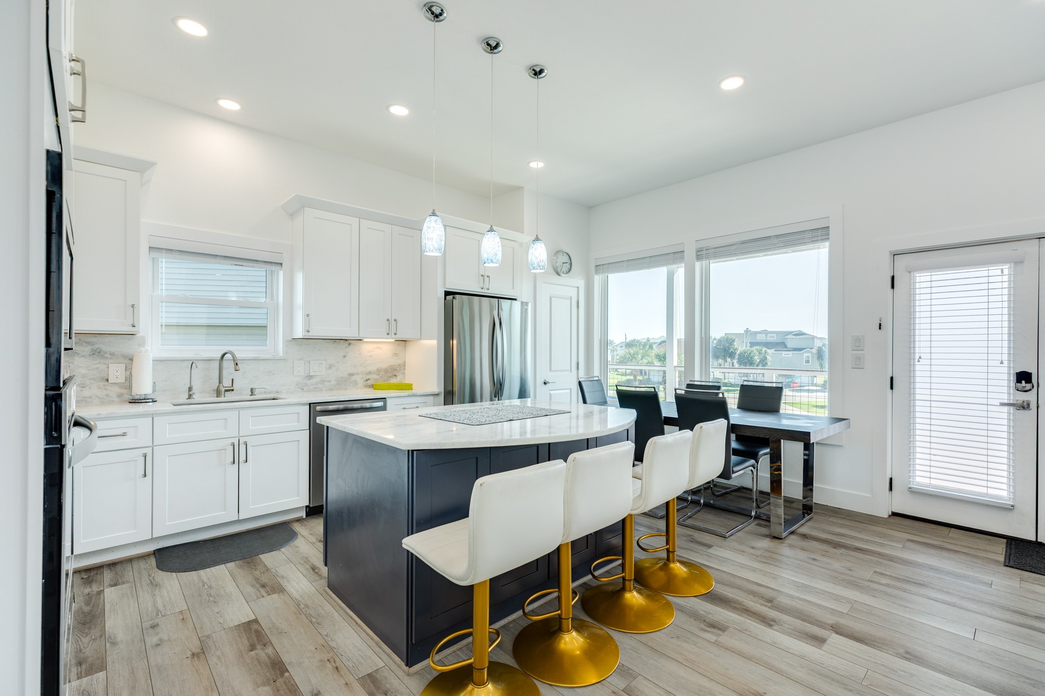 Kitchen / dining area view. Spacious covered deck just outside for dining 'al-fresco' should the desire or need arise. Kitchen / dining area view. Spacious covered deck just outside for dining 'al-fresco' should the desire or need arise.