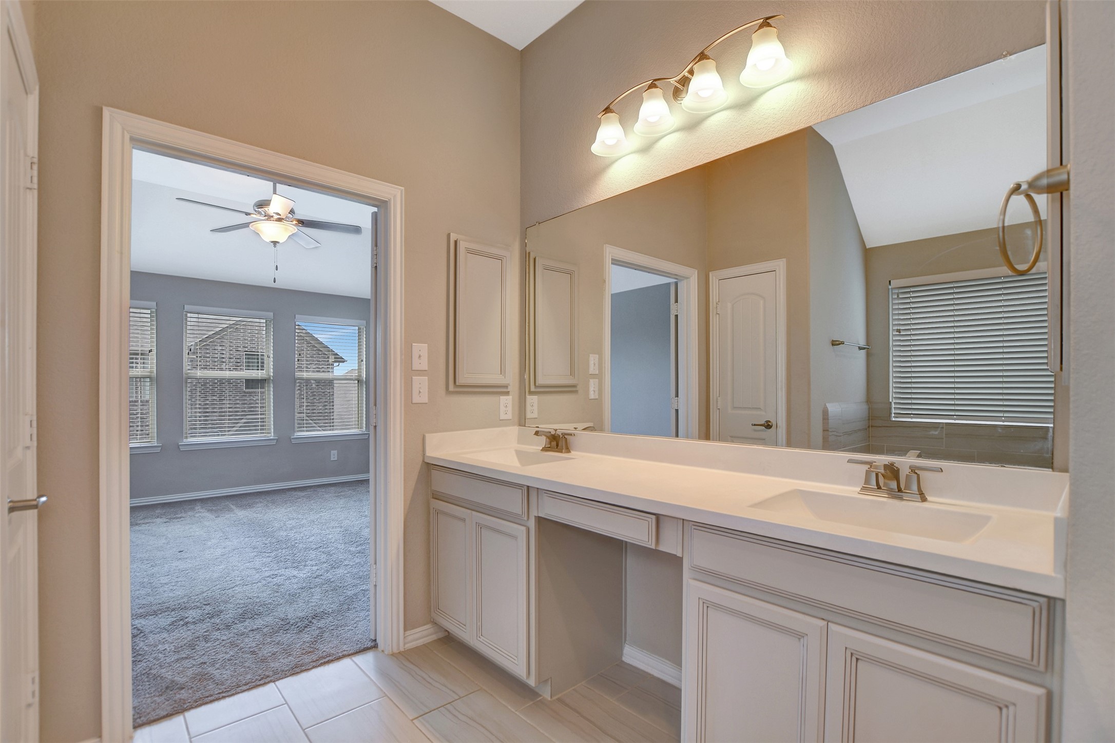 Upgraded cabinets and large mirror.