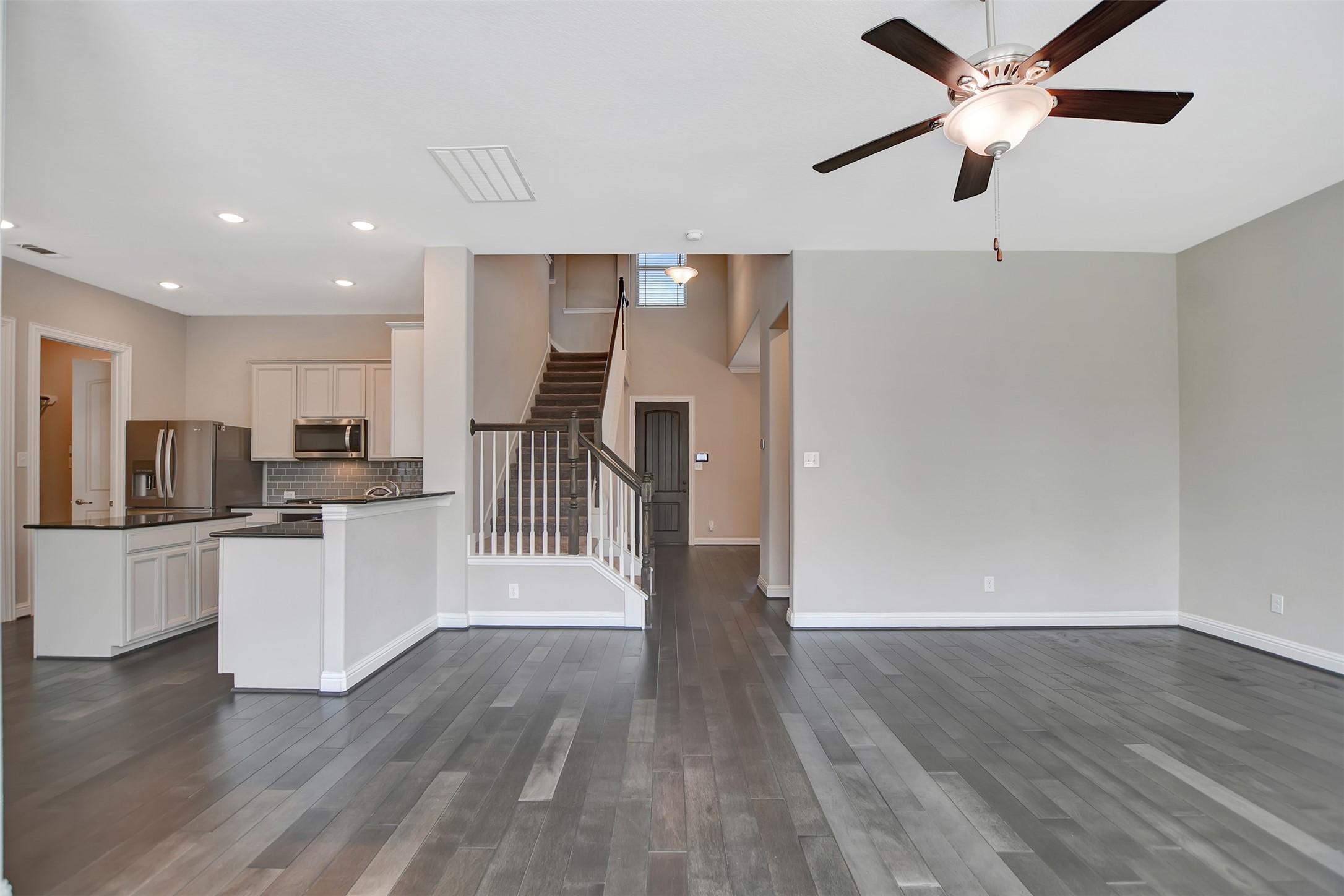 Open Floor plan,with the Family Room and the Kitchen side by side.