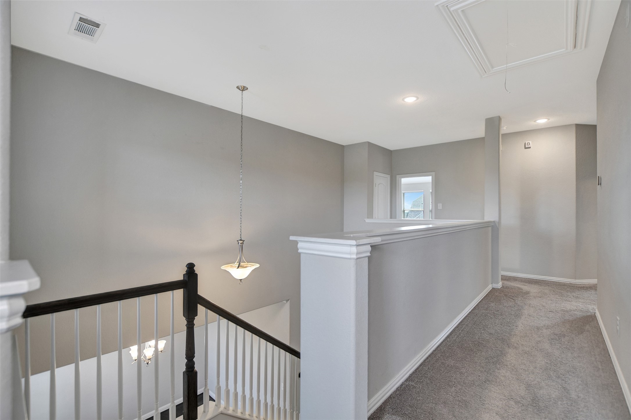 Hallway leads to all bedrooms.