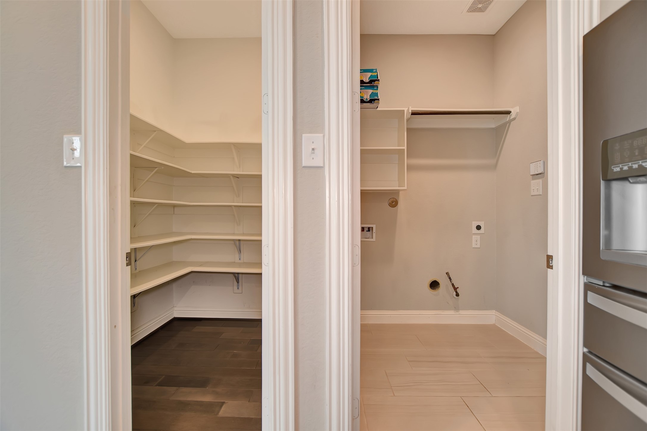 Another view of the pantry and laundry.