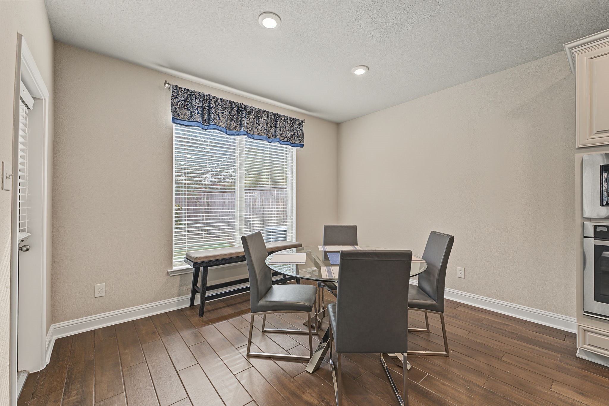 The dining area is flooded with natural light. The dining area is flooded with natural light.