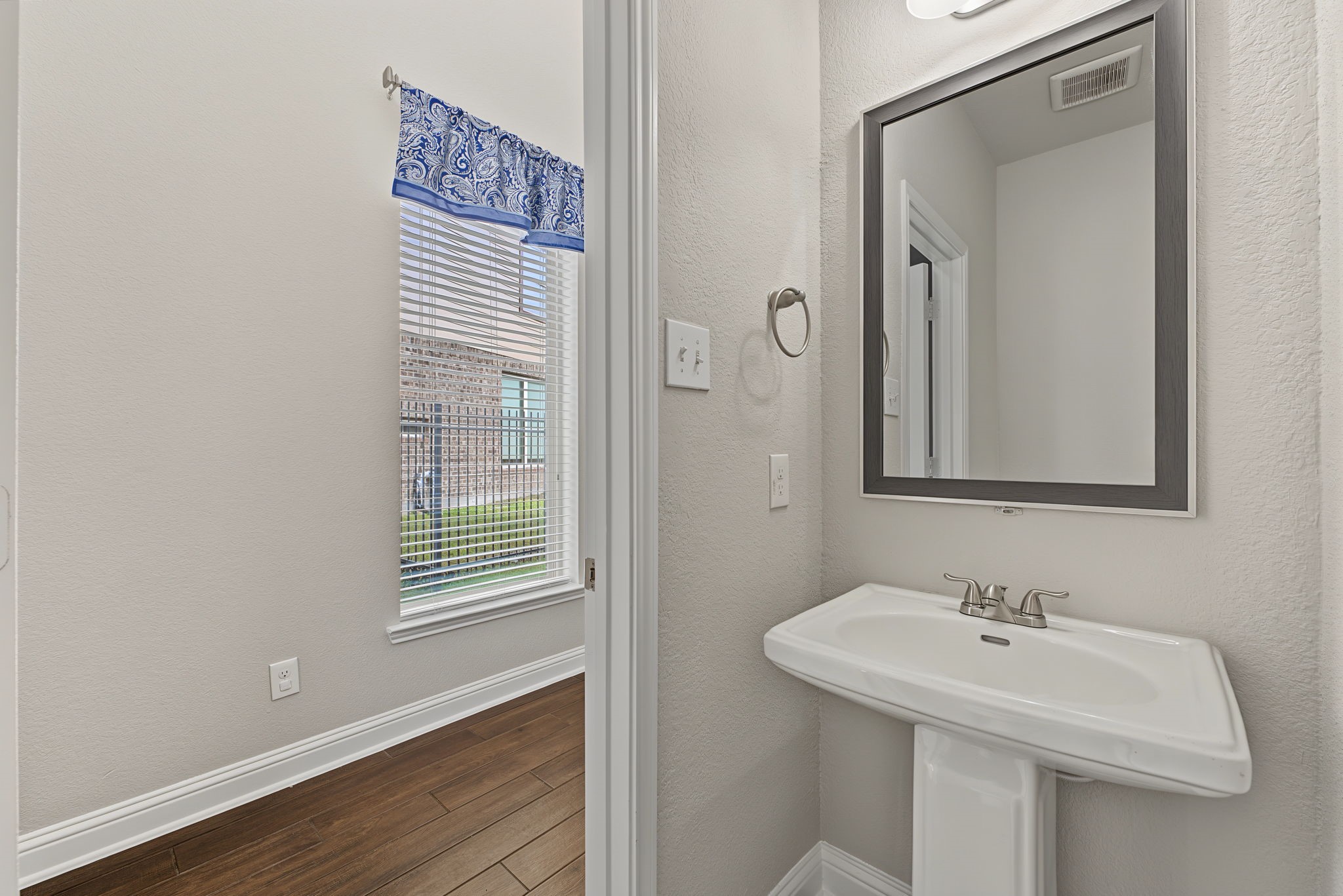 The downstairs powder room
