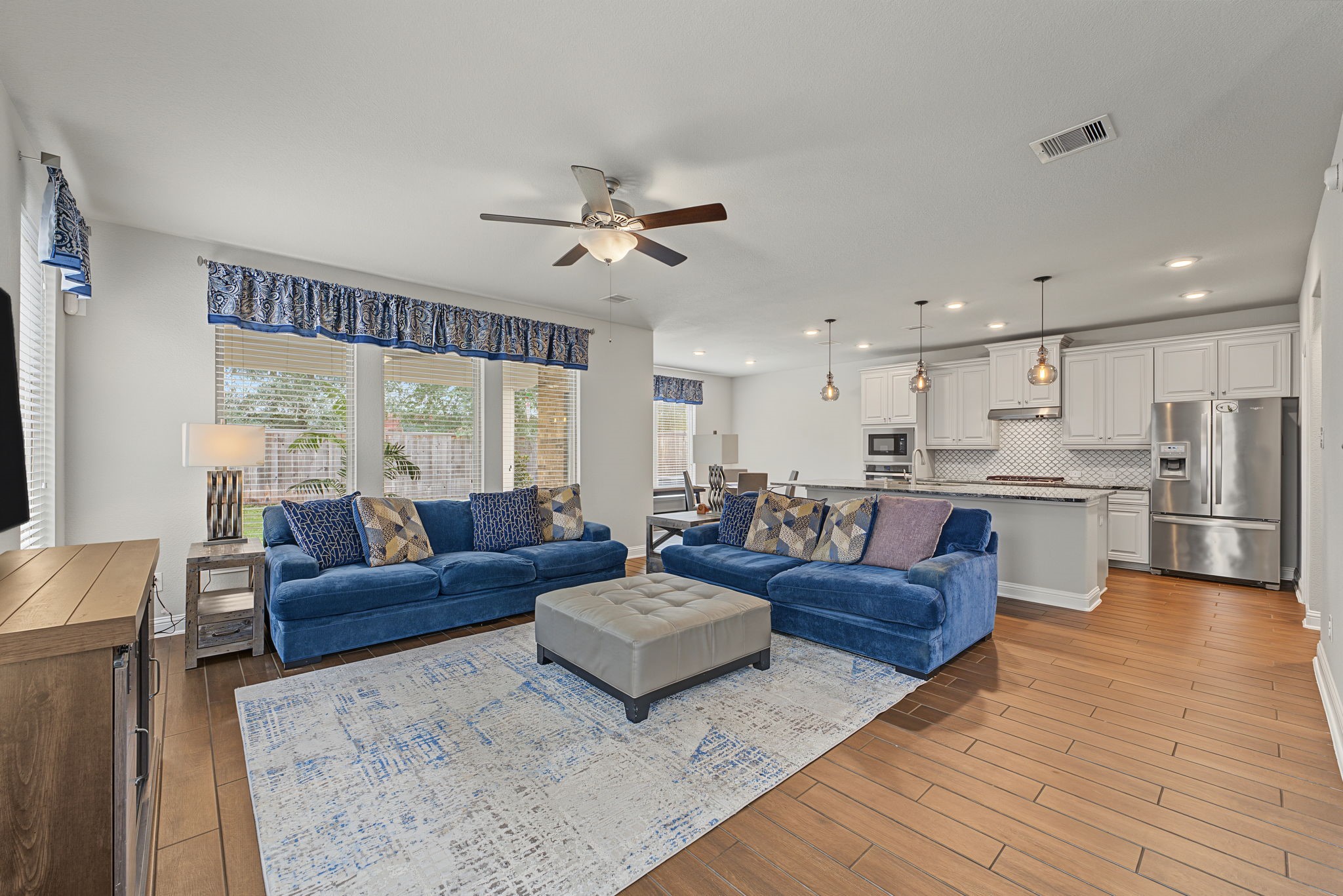 Spacious open concept living, kitchen and dining Spacious open concept living, kitchen and dining