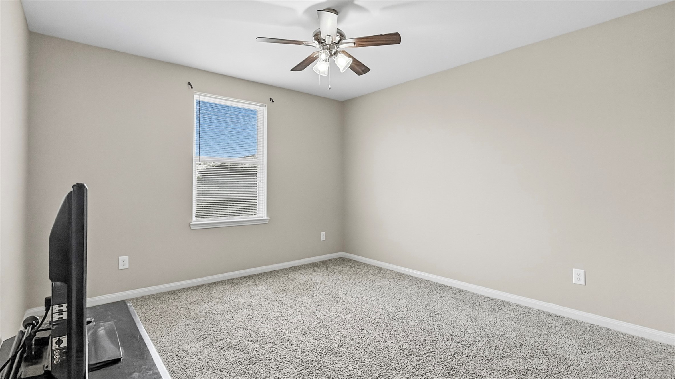 Make your way down the upstairs hallway, turn right and continue straight to access Bedroom 3 (middle bedroom upstairs).