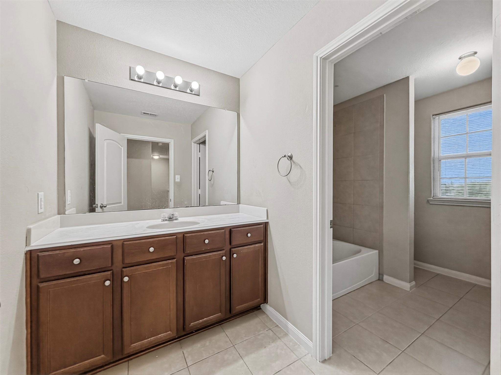 Full Bathroom upstairs, located to the right of Bedroom 2.