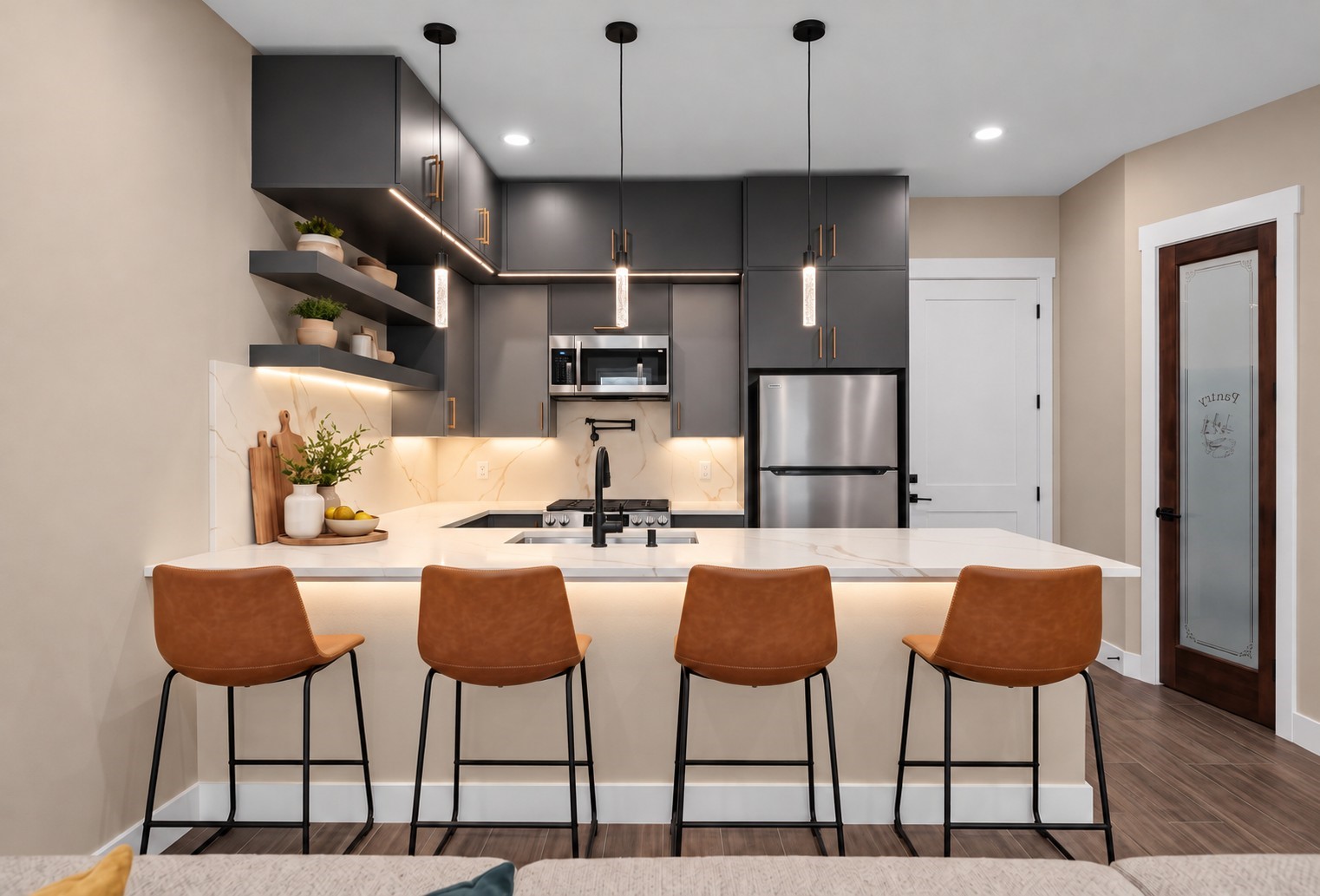 Virtually Staged: Designed for both daily living and hosting, this open kitchen features double-stacked upper cabinets for optimized storage space alongside a large functional island.
