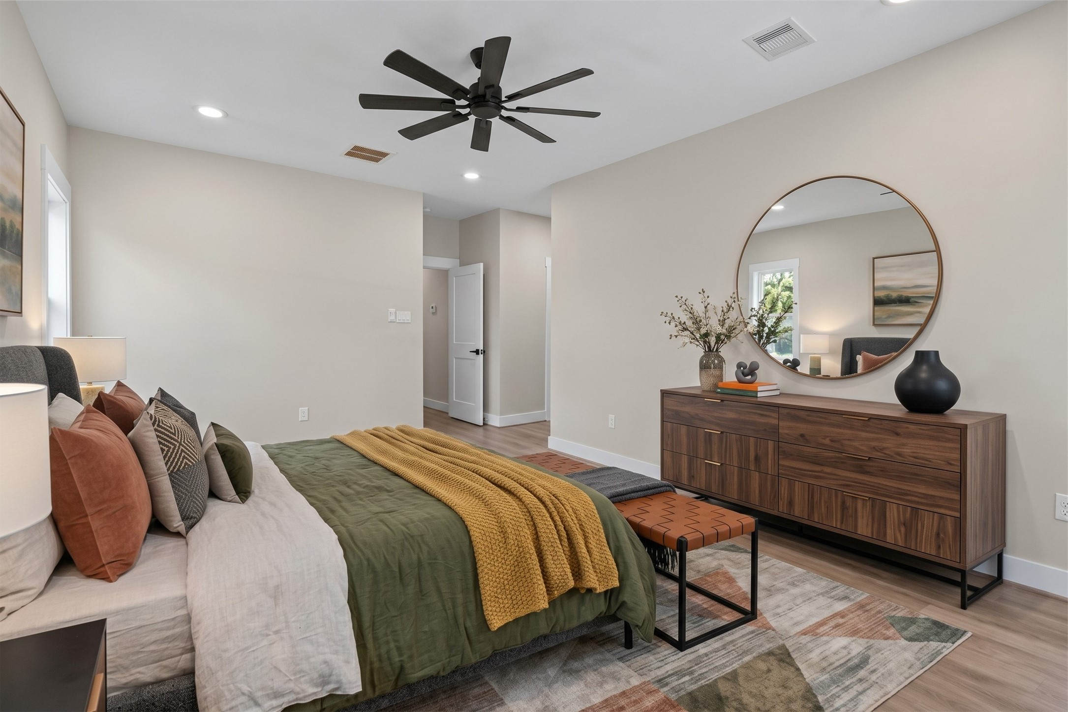 Virtually Staged: This alternate perspective highlights the vast footprint of the primary suite, showing generous wall space ideal for large dressers and storage furniture.