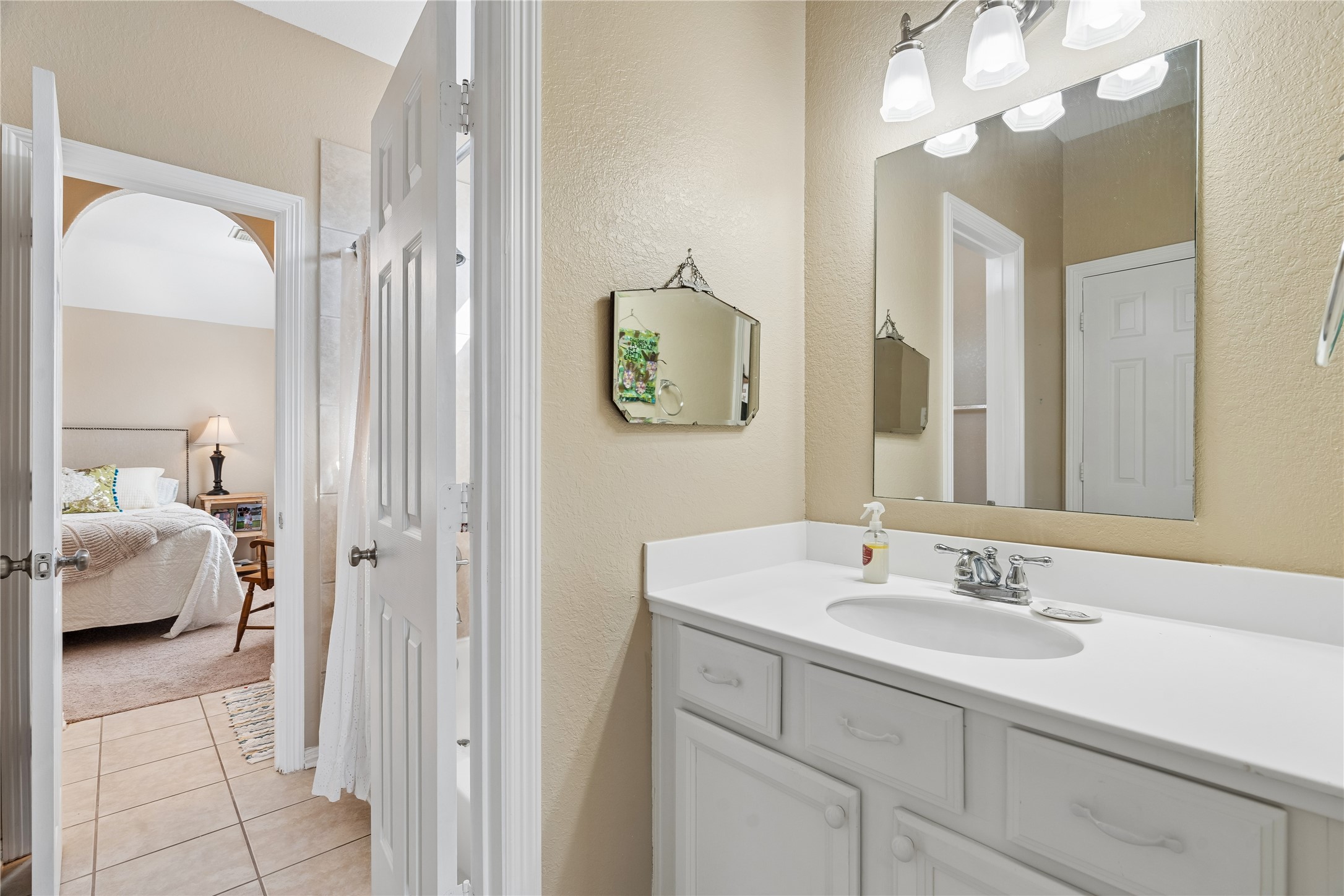 Shared Bathroom with Separate Vanity Areas