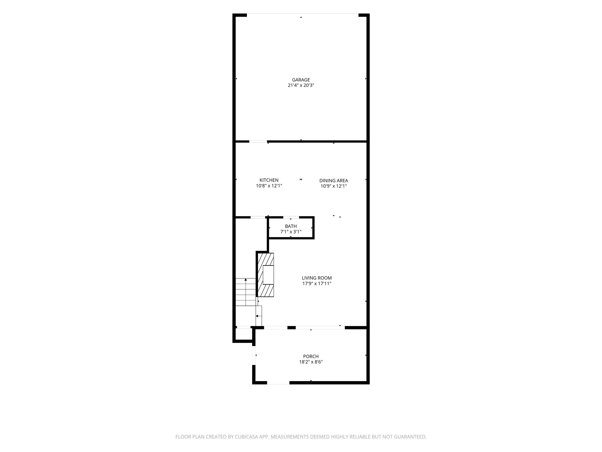This floor plan features a spacious living room, a combined kitchen and dining area, a convenient bathroom, and a large garage, all accessible from a welcoming porch.