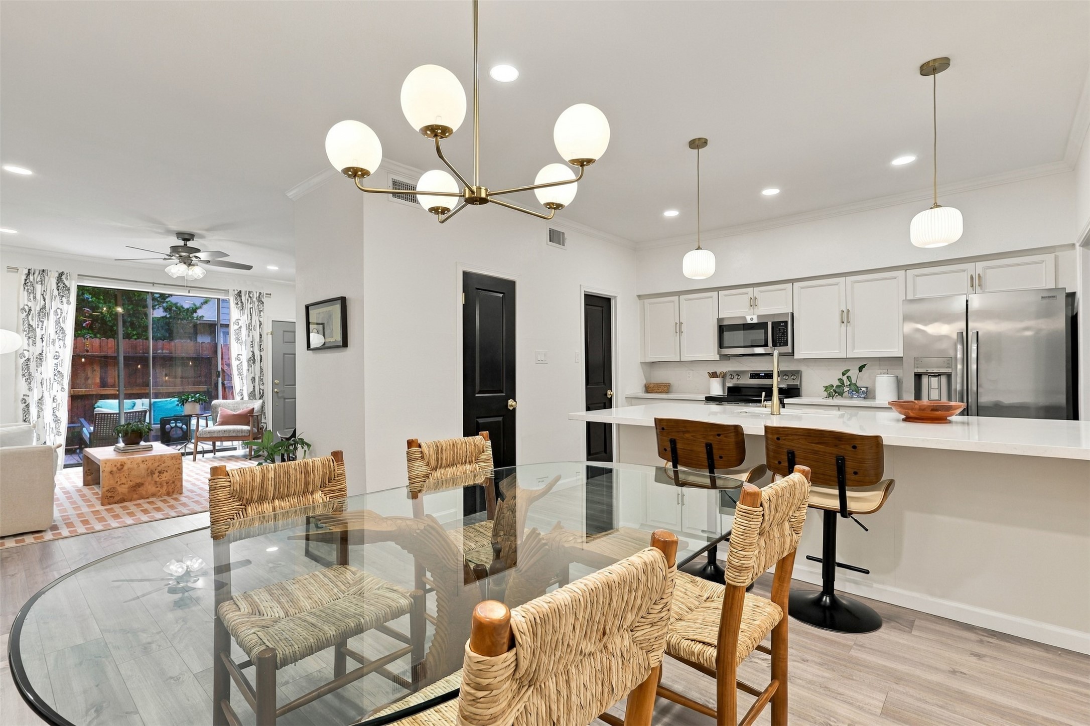 Open sightlines to the kitchen and living room make the dining area equally suited to quiet dinners and entertaining.