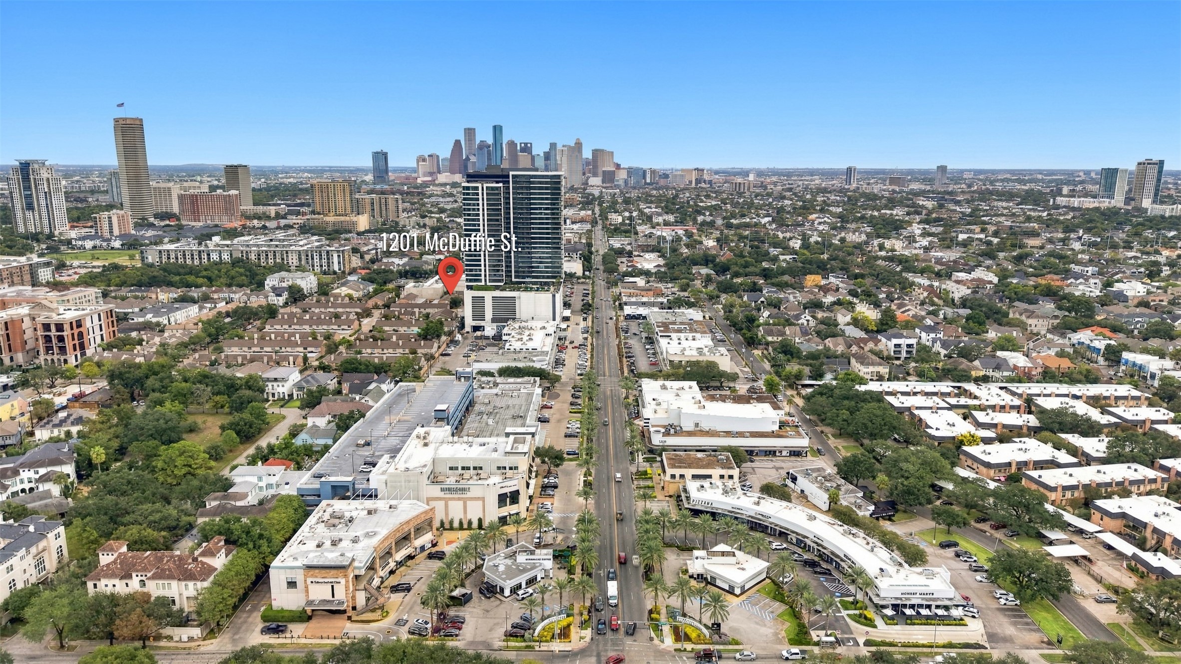 Prime location in a vibrant urban setting, offering proximity to downtown amenities, shopping, and dining with a clear view of the city skyline.