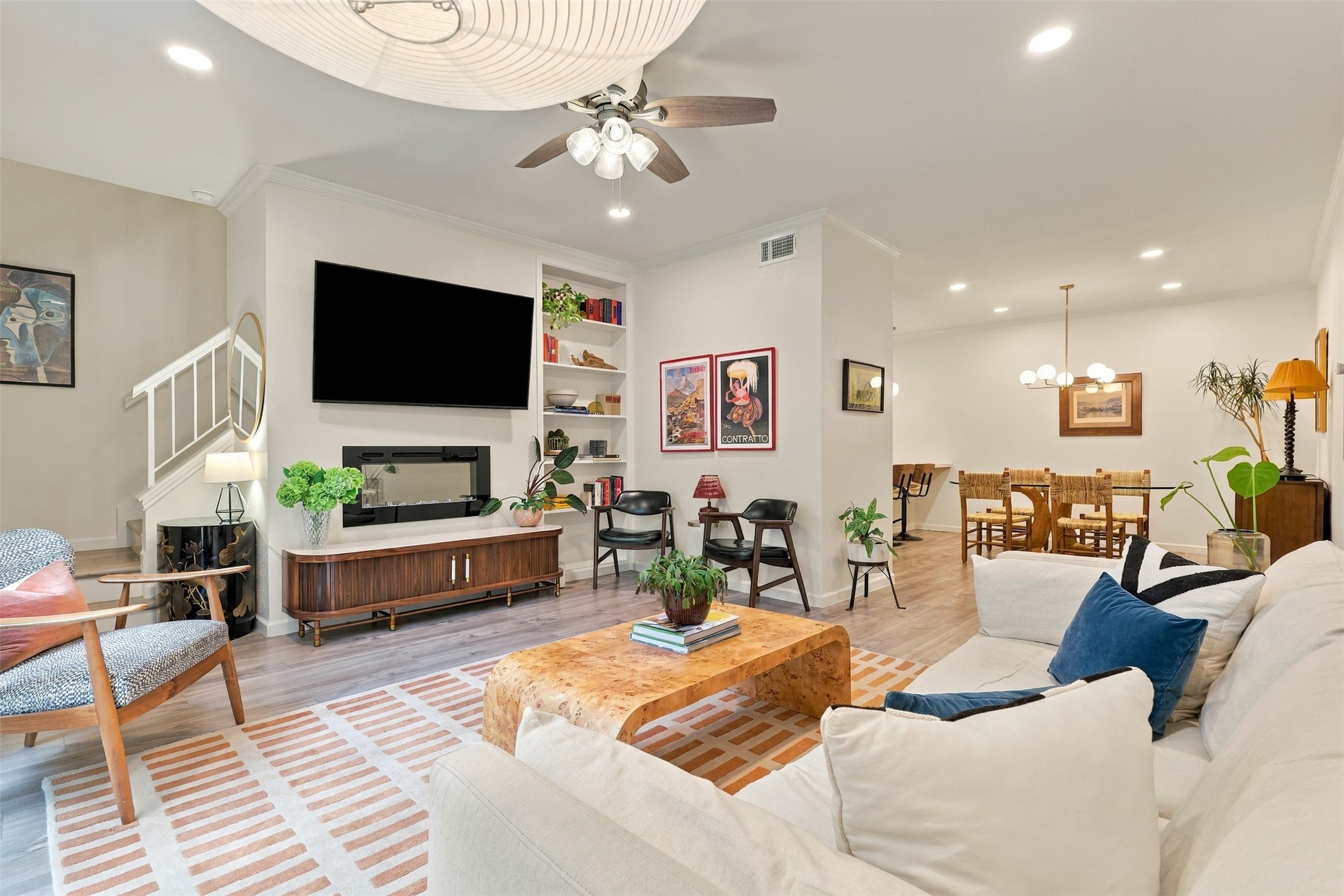 The opened-up first floor connects living, dining and kitchen spaces for effortless gatherings.