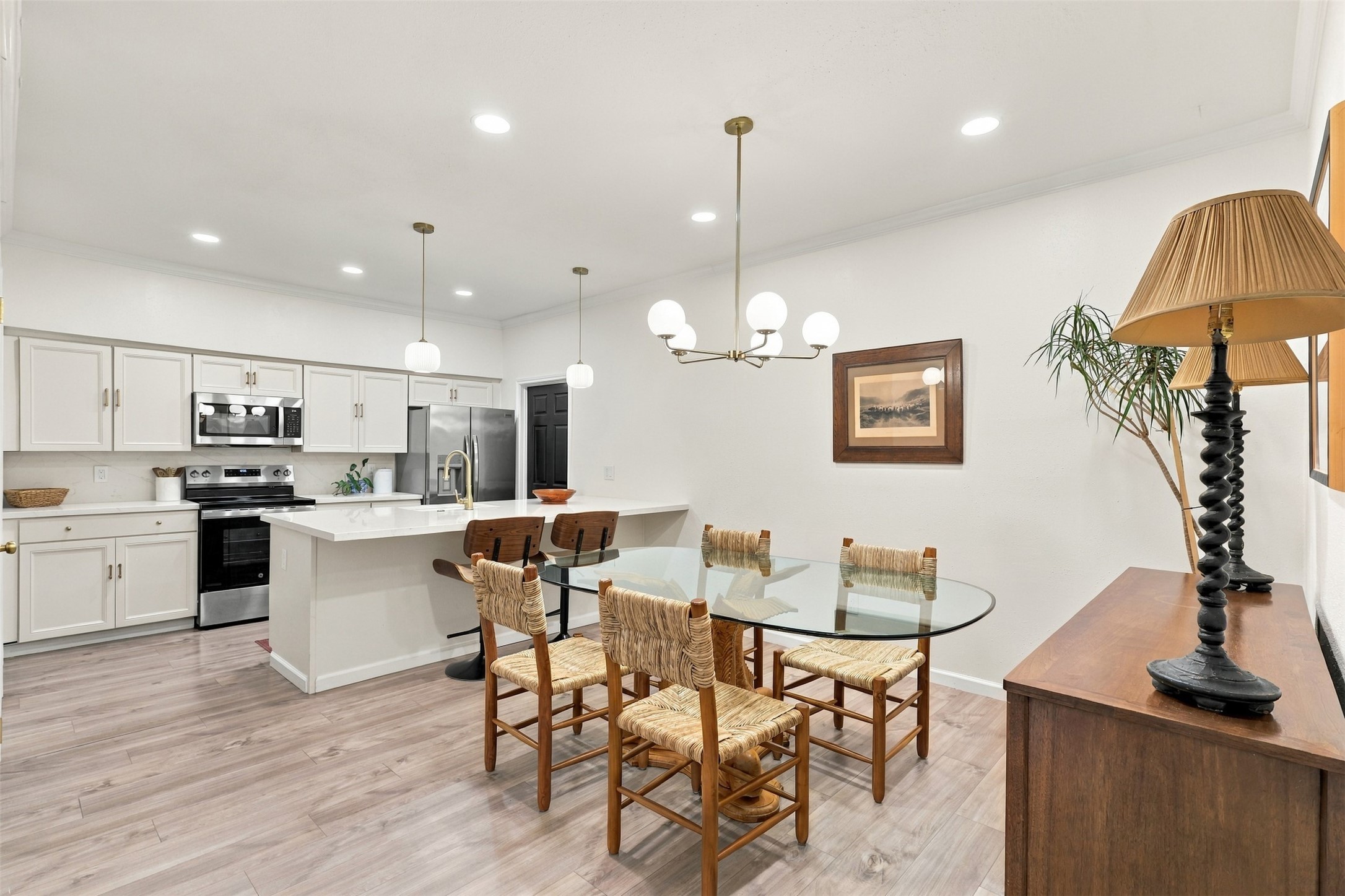 The reconfigured main level lets conversation flow between the dining area, kitchen and living room.