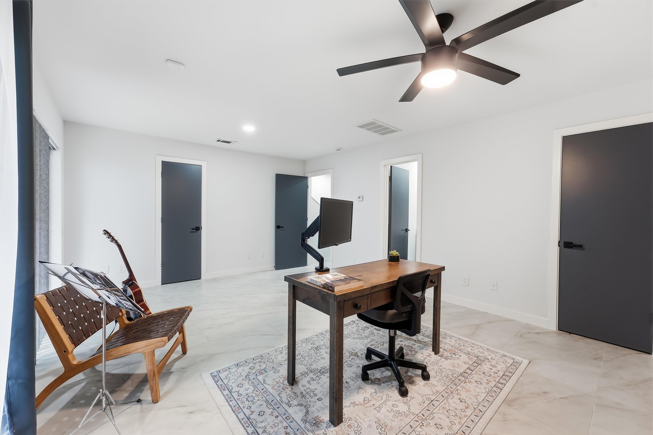 Guest Bedroom on the first floor has two walk-in closets.