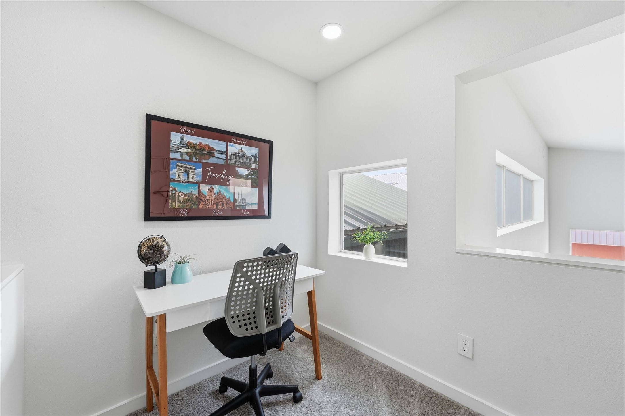 Cute bonus room adjacent to the primary bedroom. Imagine the possibilities! You'd look great on Zoom here. (See all that natural light?) You could outfit the bonus room as a coffee bar to start your day or a wine bar to end it. This space would make a great hobby room.